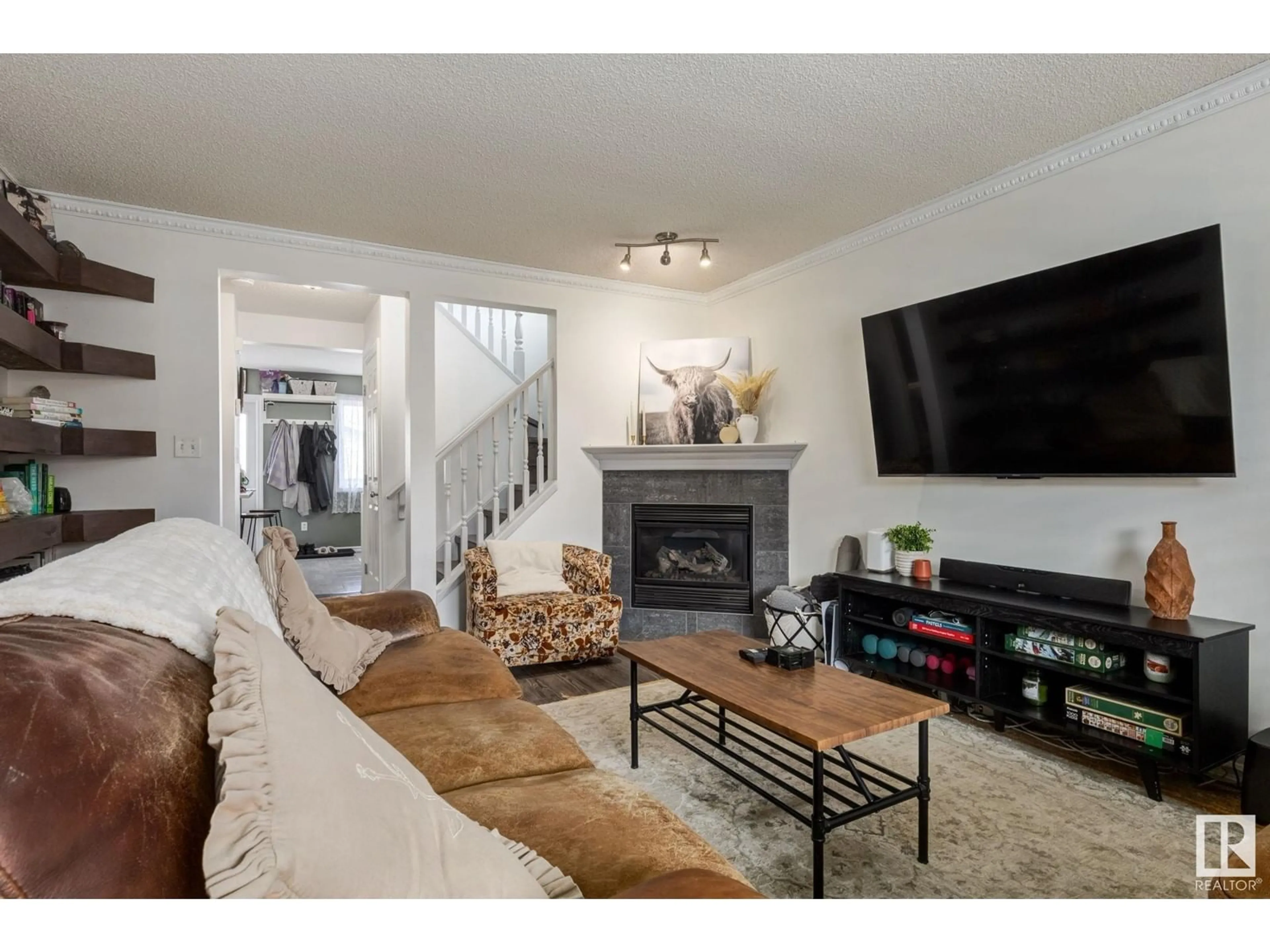 Living room with furniture, unknown for 3908 160 AV, Edmonton Alberta T5Y3J7