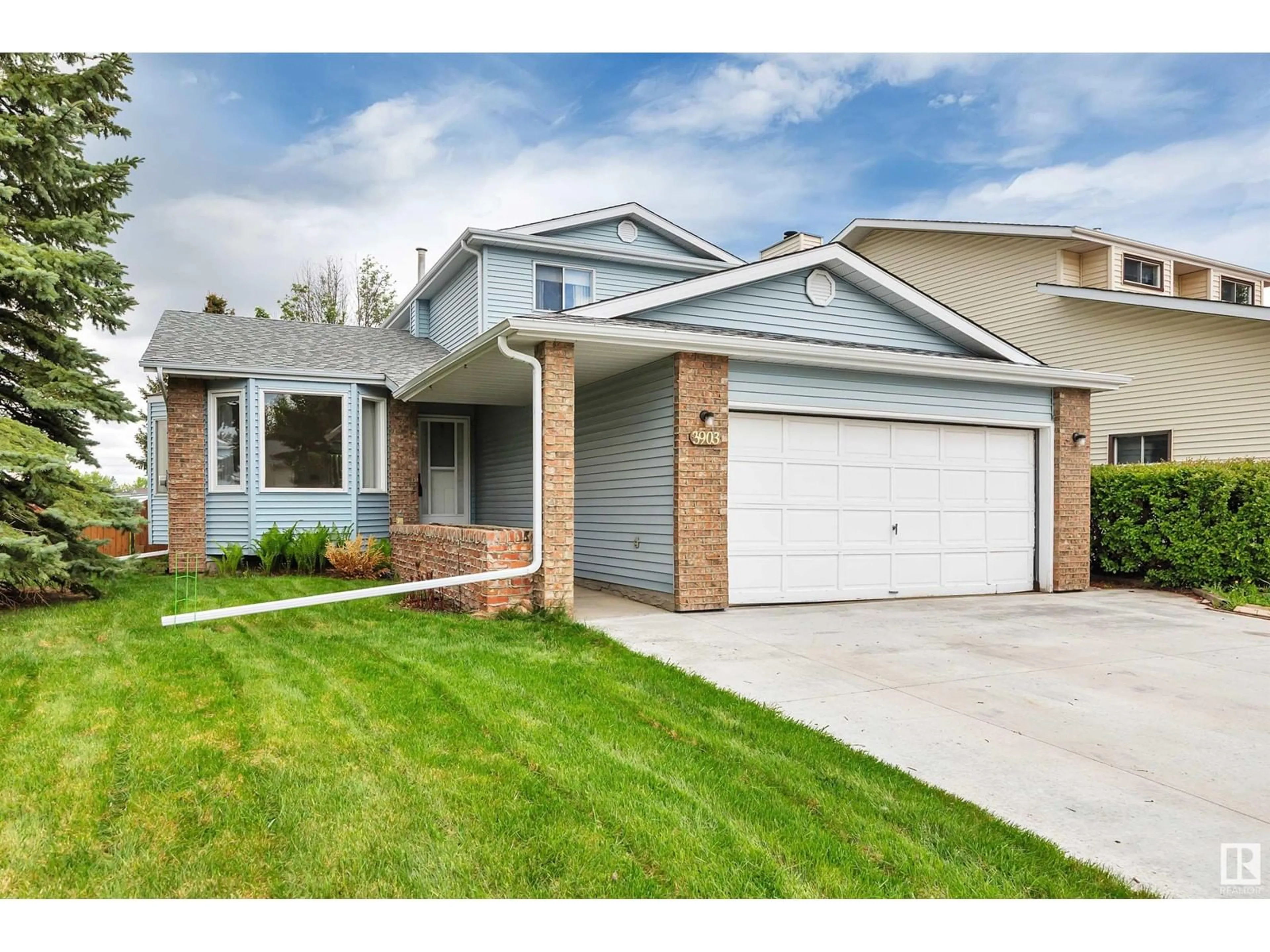 Home with vinyl exterior material, street for 3903 35 AV, Edmonton Alberta T6L5E7
