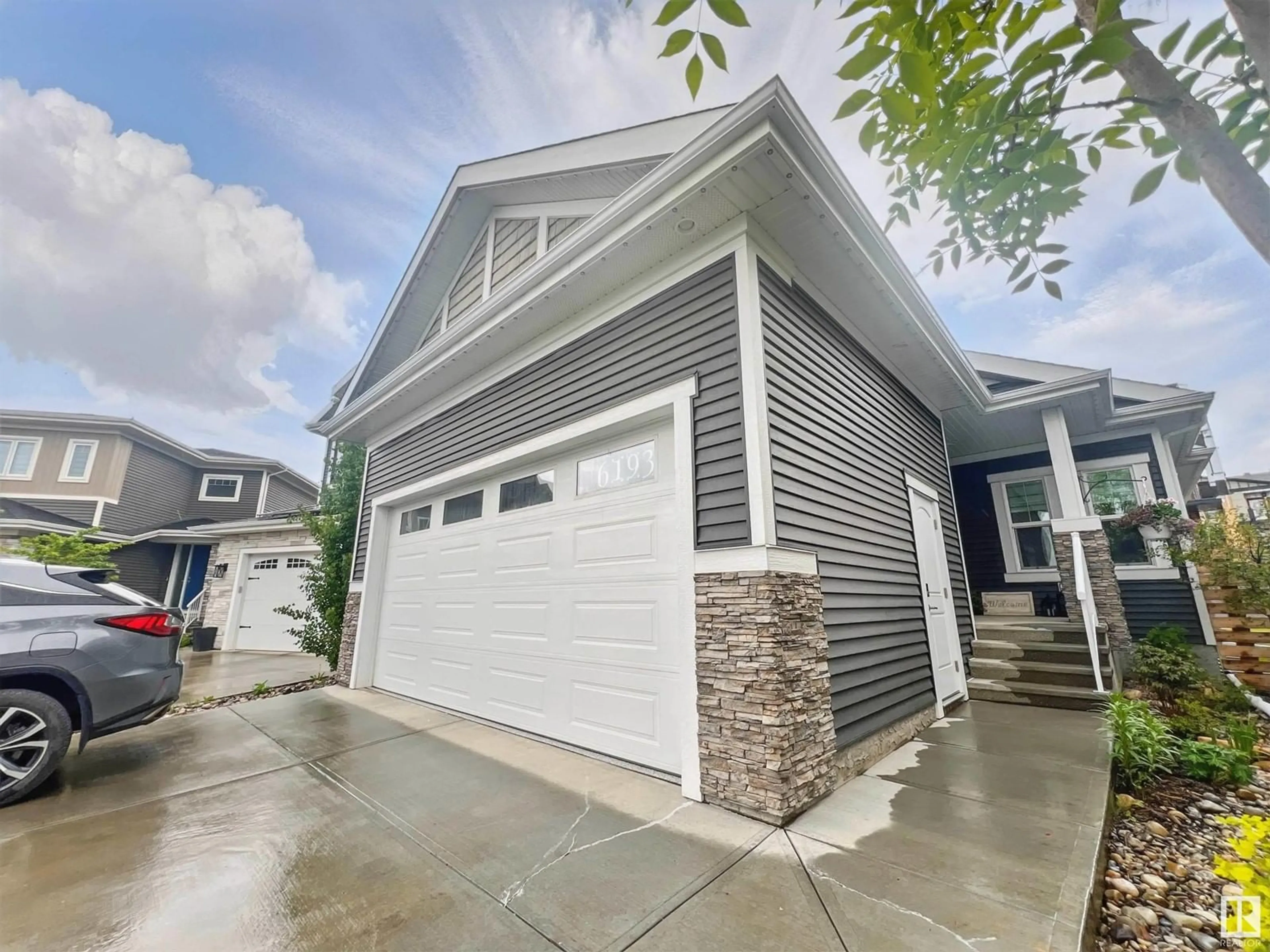 Home with vinyl exterior material, street for 6193 CARR RD, Edmonton Alberta T5E6Y5