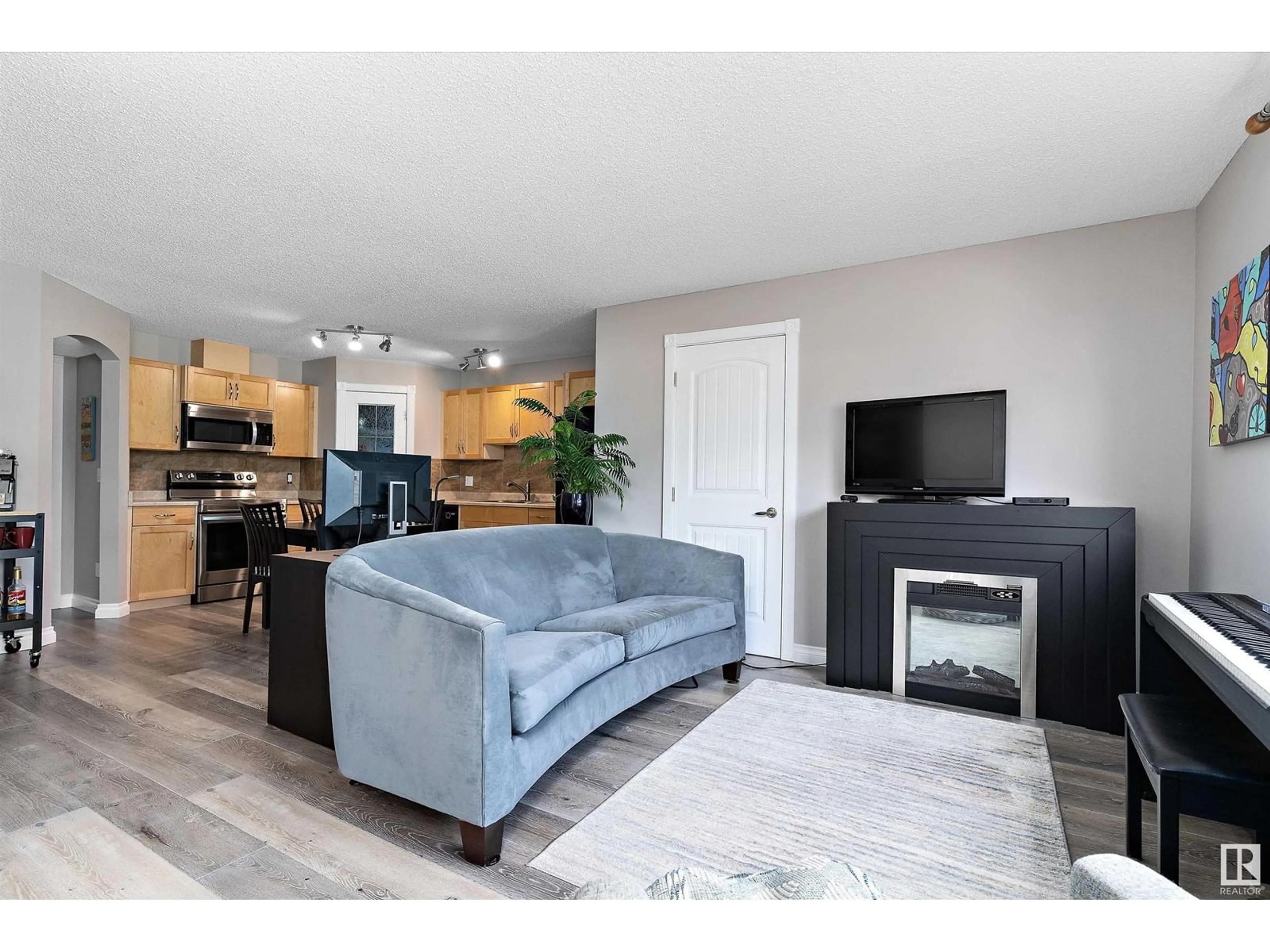 Living room with furniture, unknown for SW - 89 604 62 ST, Edmonton Alberta T6X0K4