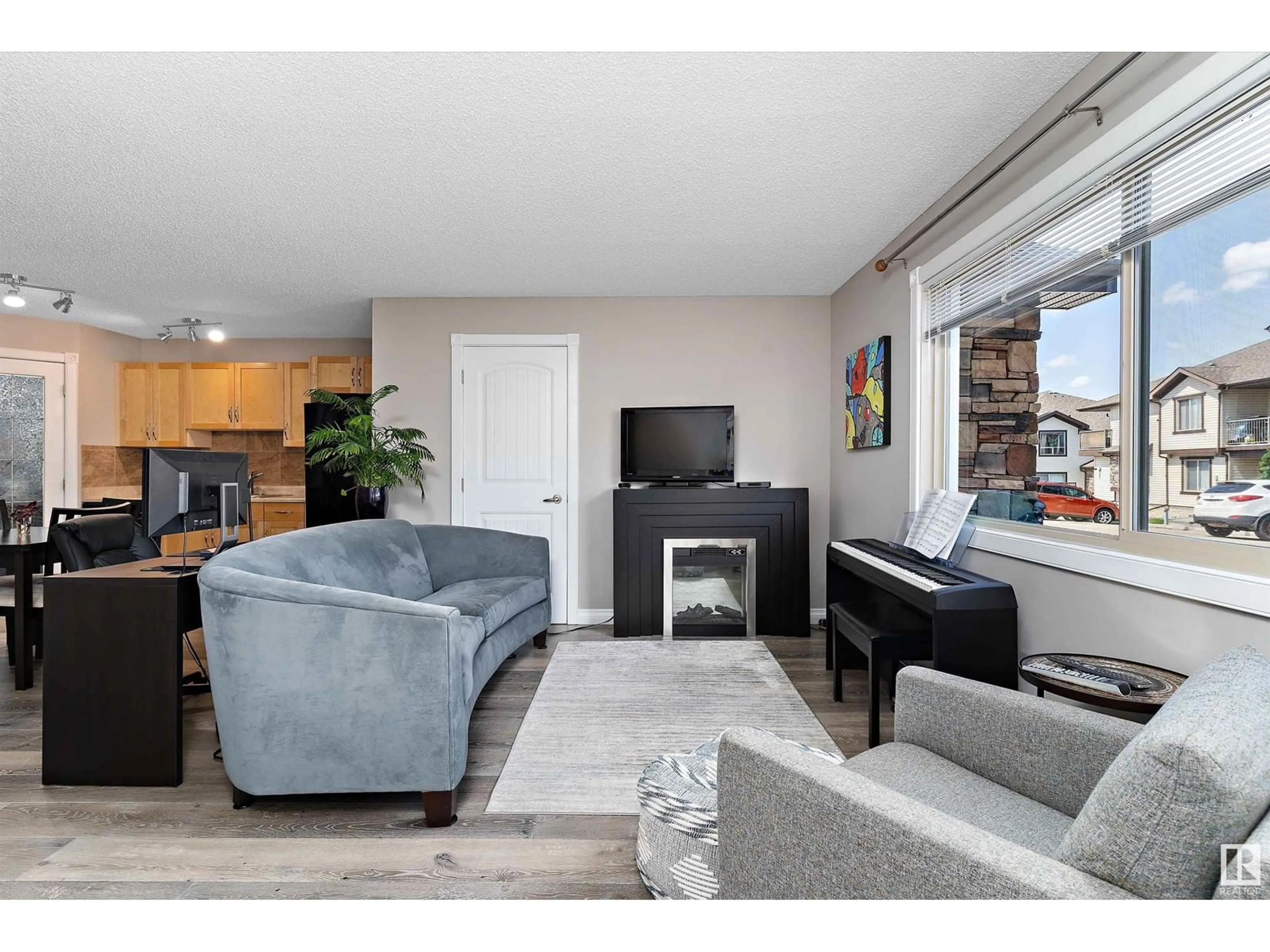Living room with furniture, unknown for SW - 89 604 62 ST, Edmonton Alberta T6X0K4