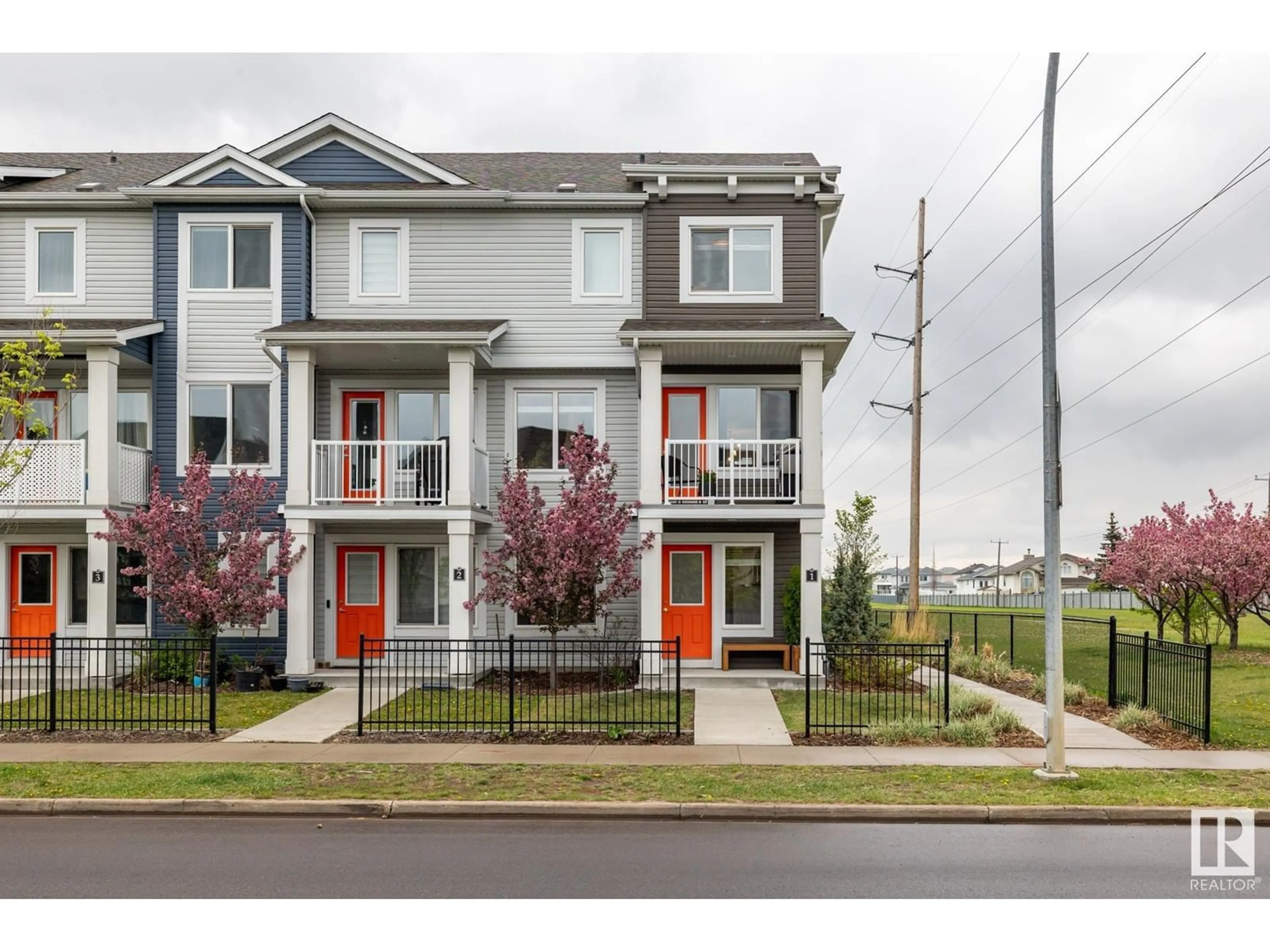 Home with vinyl exterior material, street for 16335 84 ST, Edmonton Alberta T5Z0S1