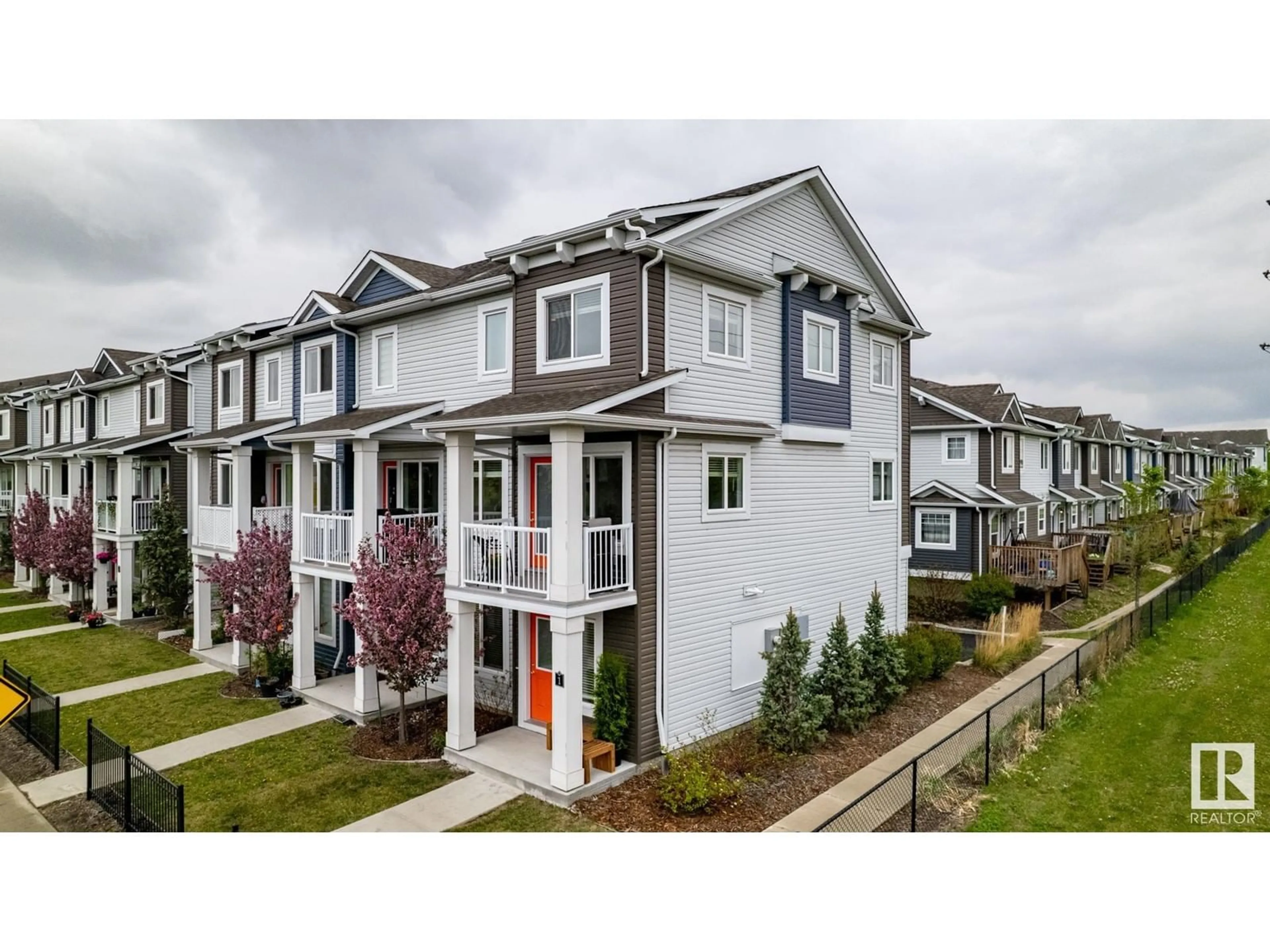 Home with vinyl exterior material, street for 16335 84 ST, Edmonton Alberta T5Z0S1