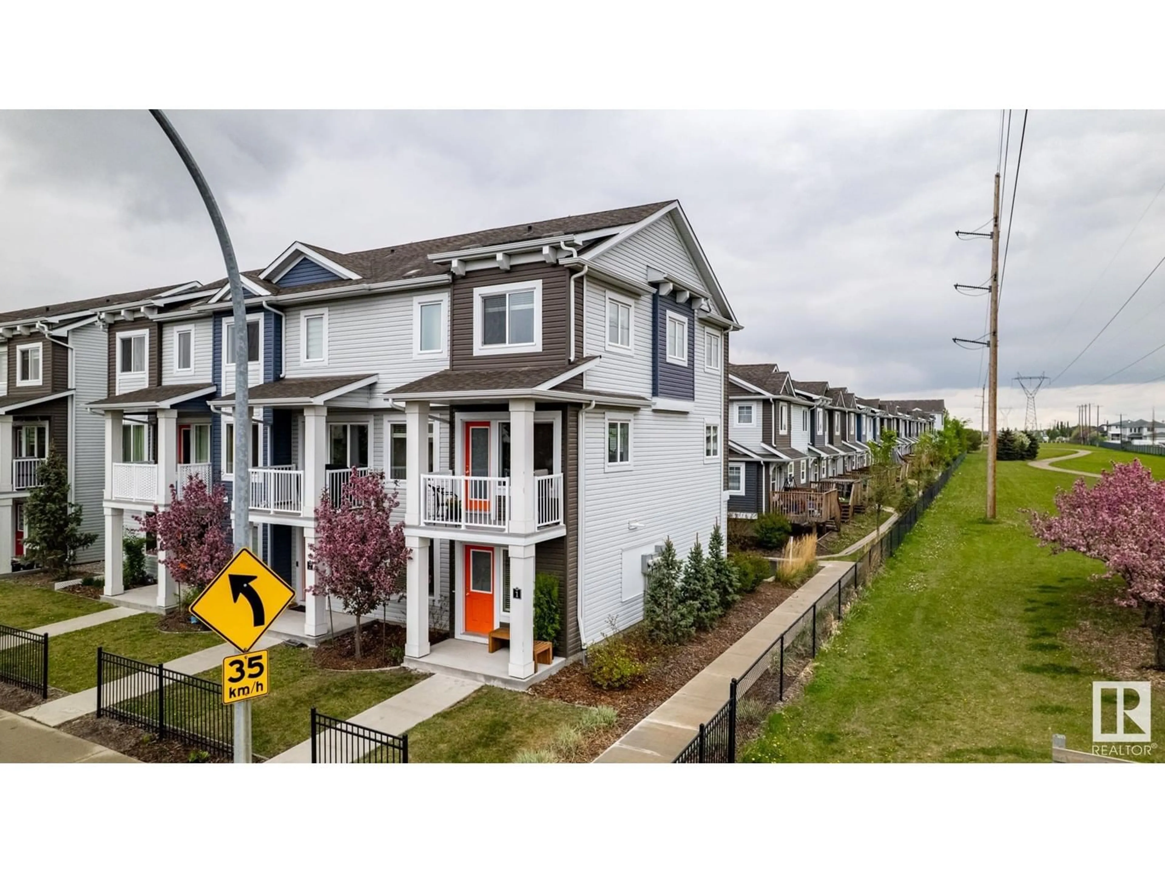 Home with vinyl exterior material, street for 16335 84 ST, Edmonton Alberta T5Z0S1