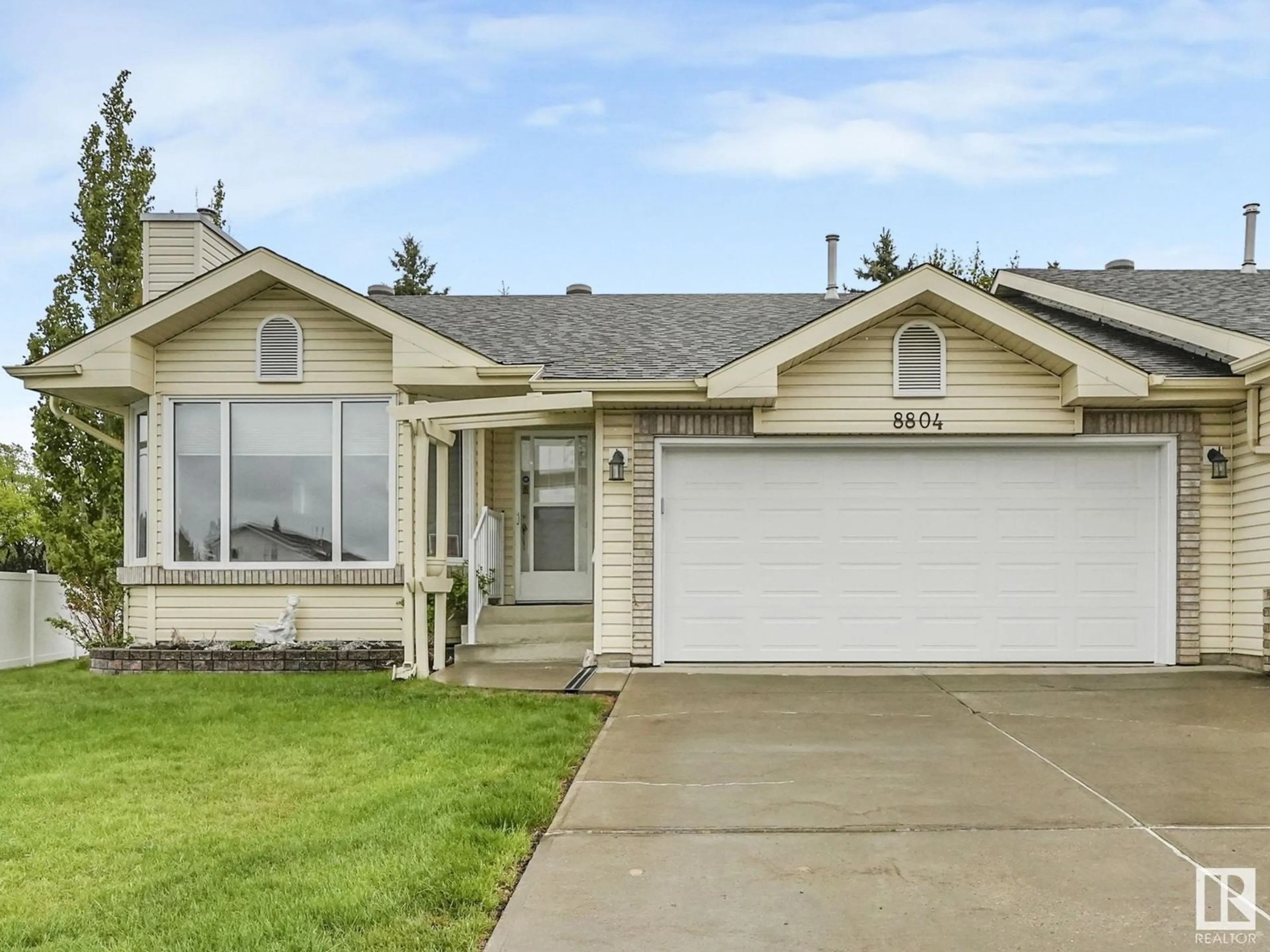 Home with vinyl exterior material, street for 8804 189 ST NW, Edmonton Alberta T5T6C3