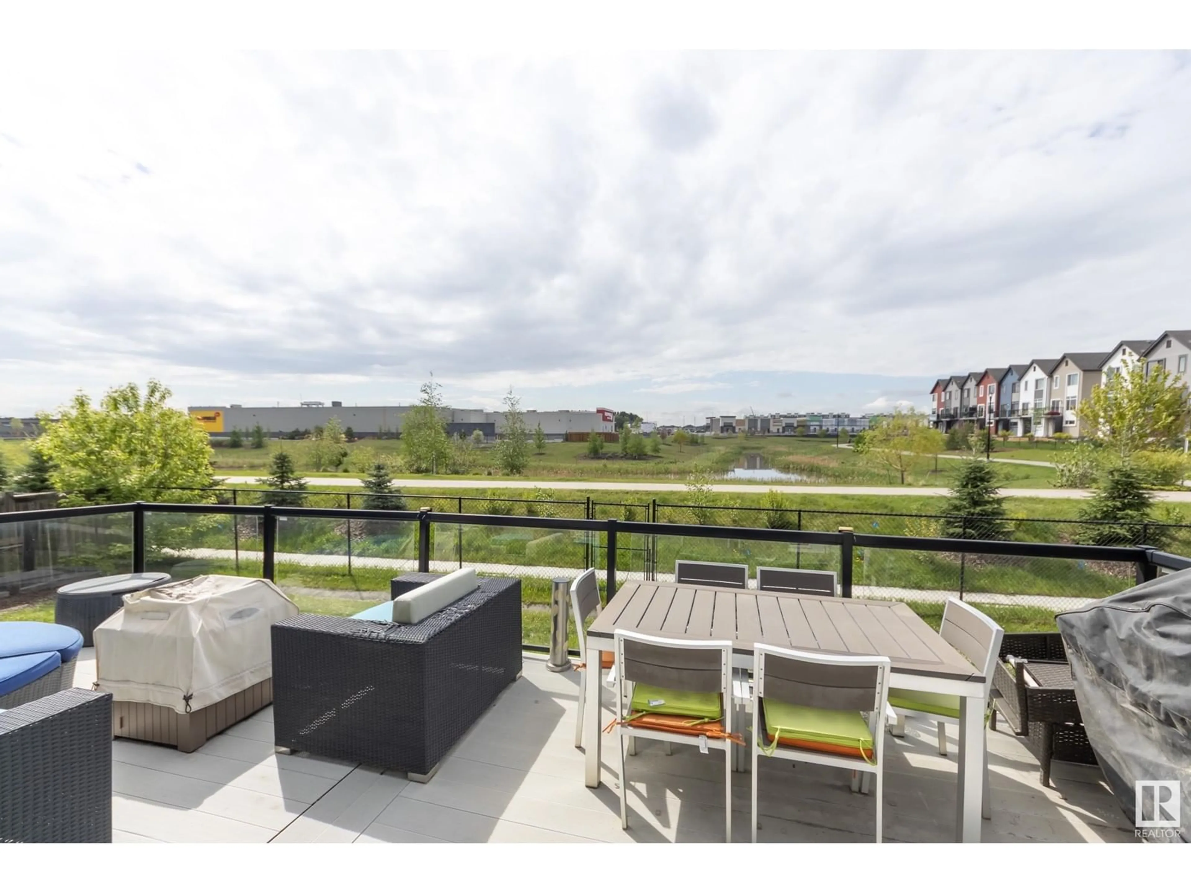 Patio, water/lake/river/ocean view for 21729 94A AV, Edmonton Alberta T5T1M9