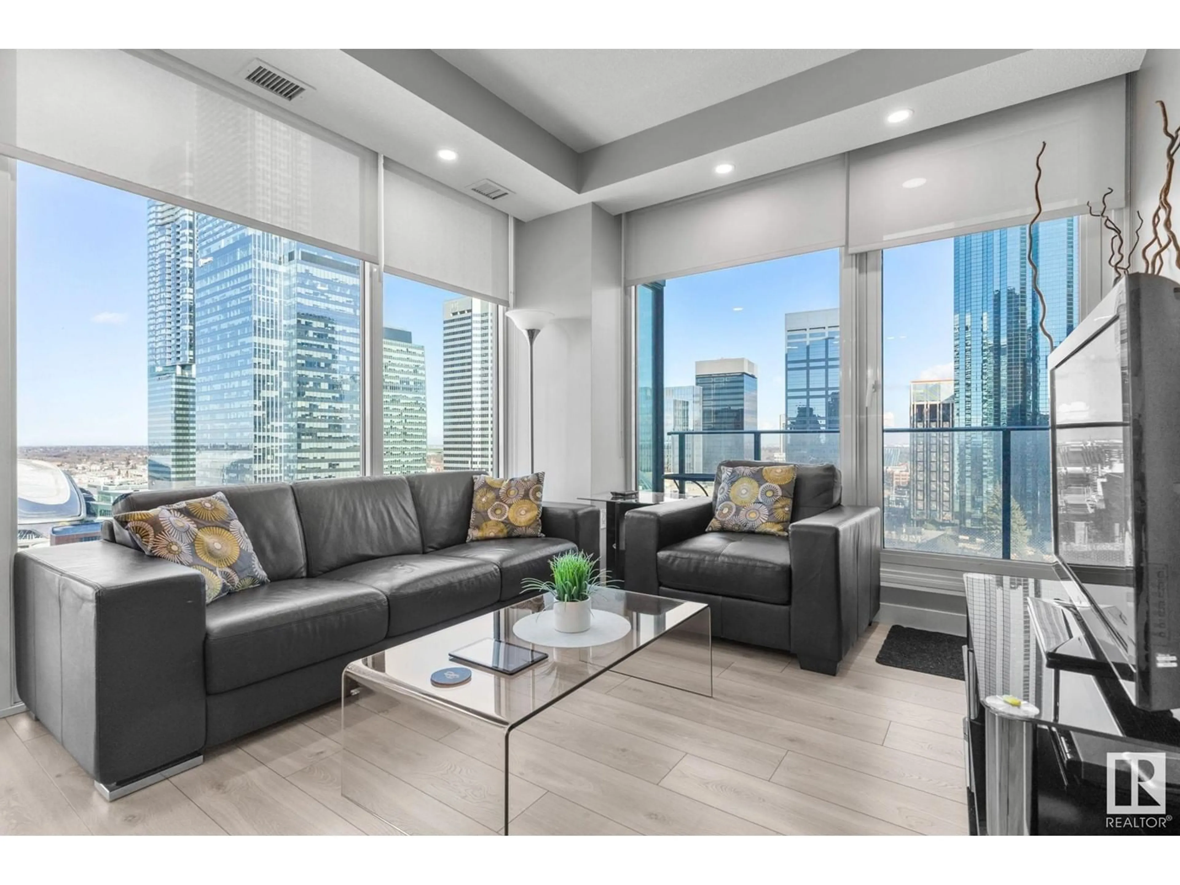 Living room with furniture, unknown for NW - 10180 103 ST, Edmonton Alberta T5J0L1