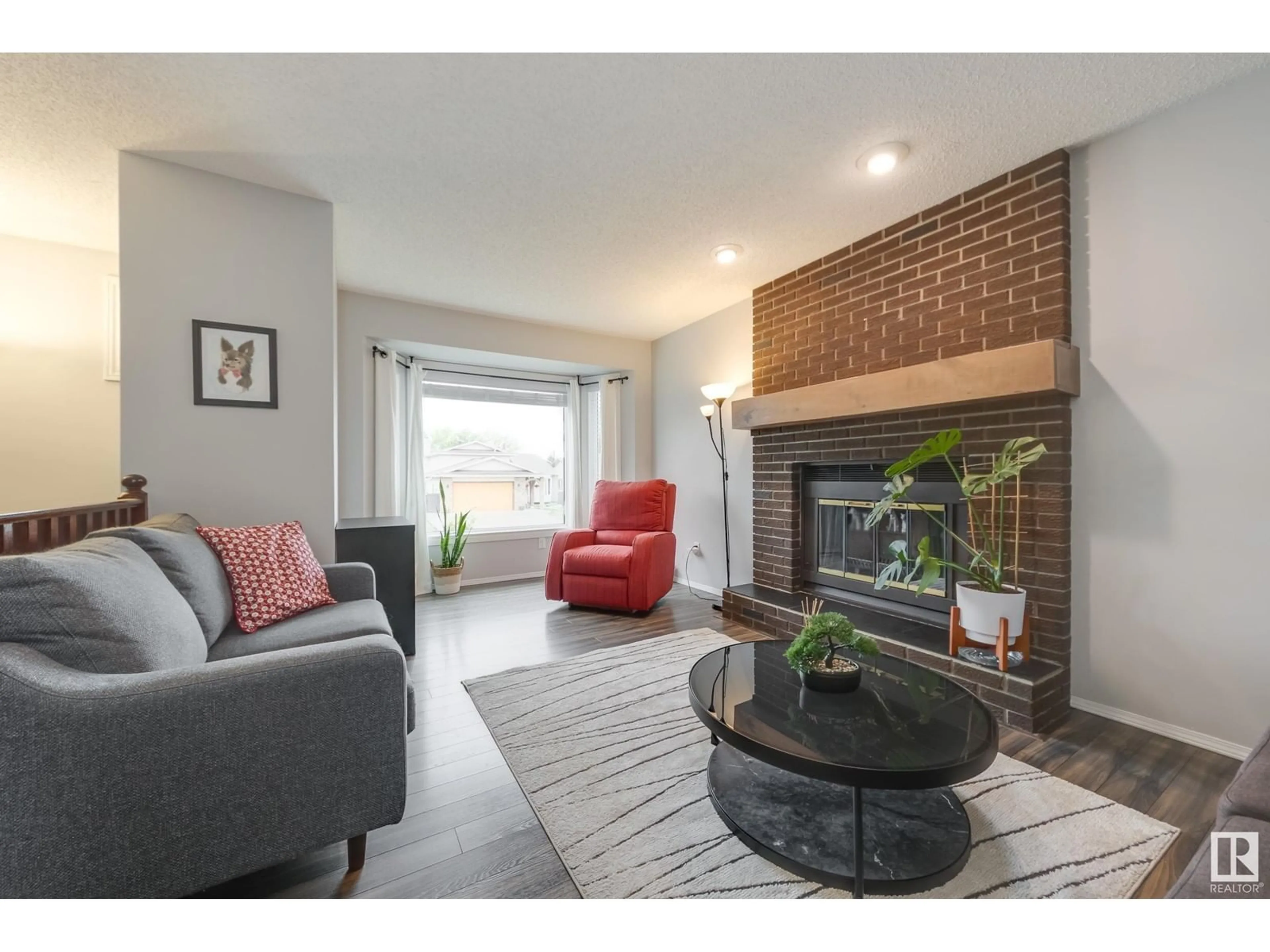 Living room with furniture, unknown for NW - 7004 152C AV, Edmonton Alberta T5C3P4