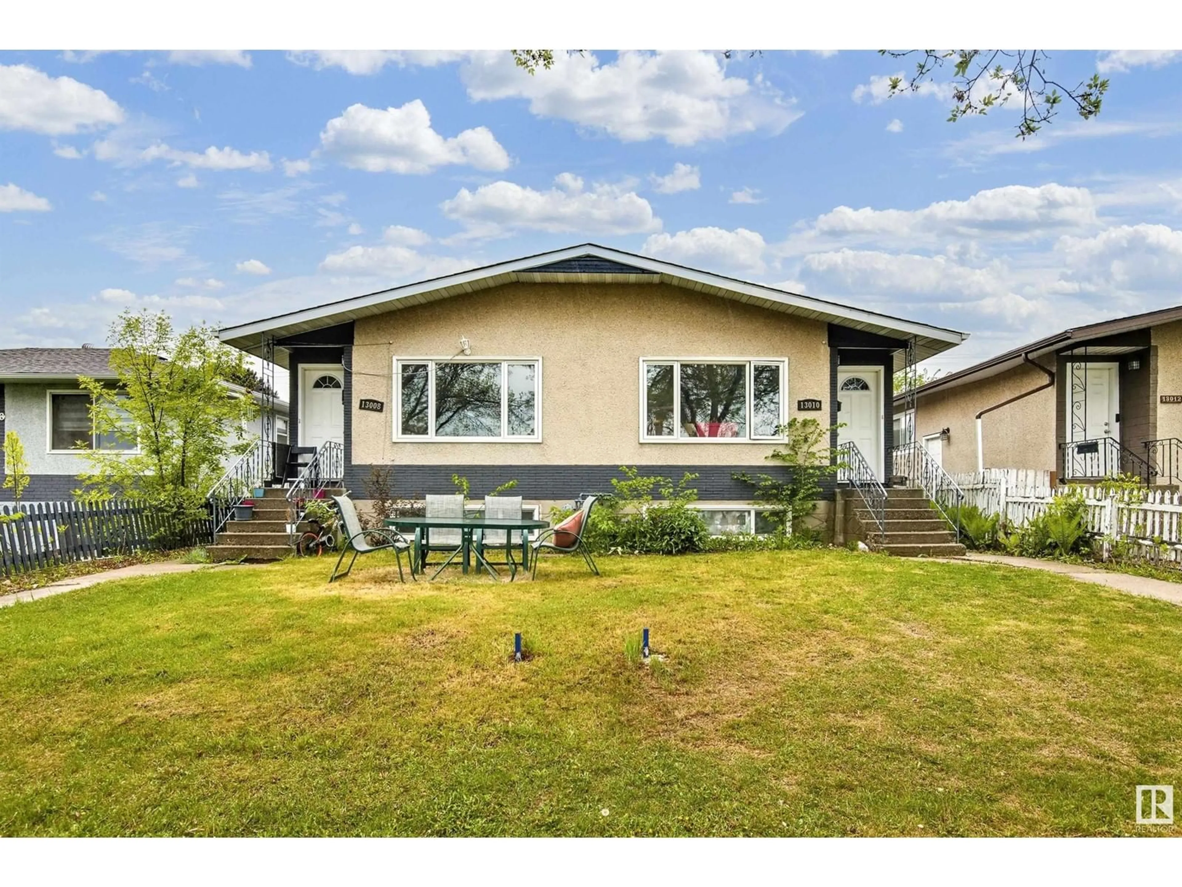 Home with vinyl exterior material, street for NW - 13008-130010 102 ST, Edmonton Alberta T6H4B2