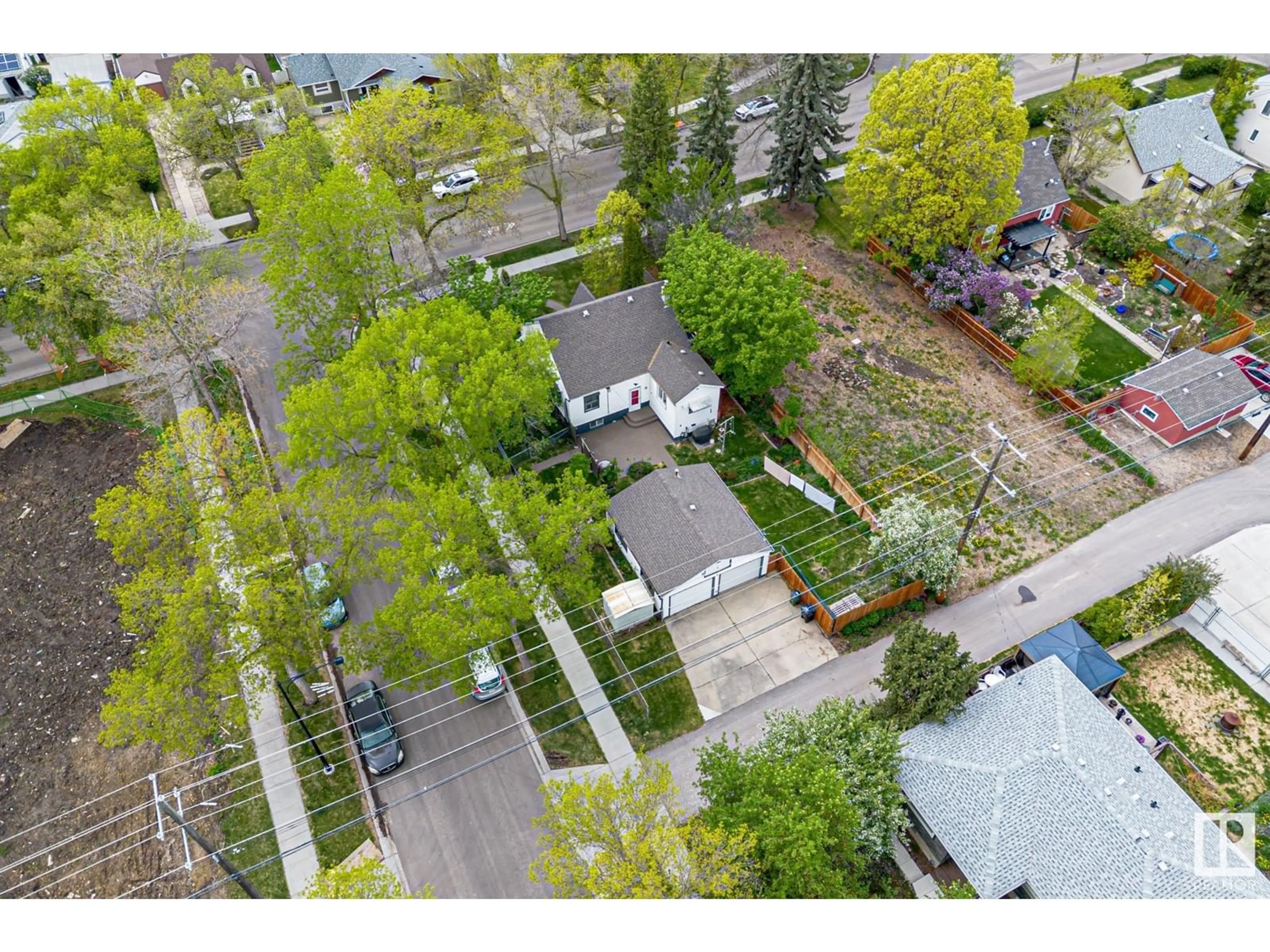 A pic from outside/outdoor area/front of a property/back of a property/a pic from drone, street for 11003 135 ST, Edmonton Alberta T5M1K4