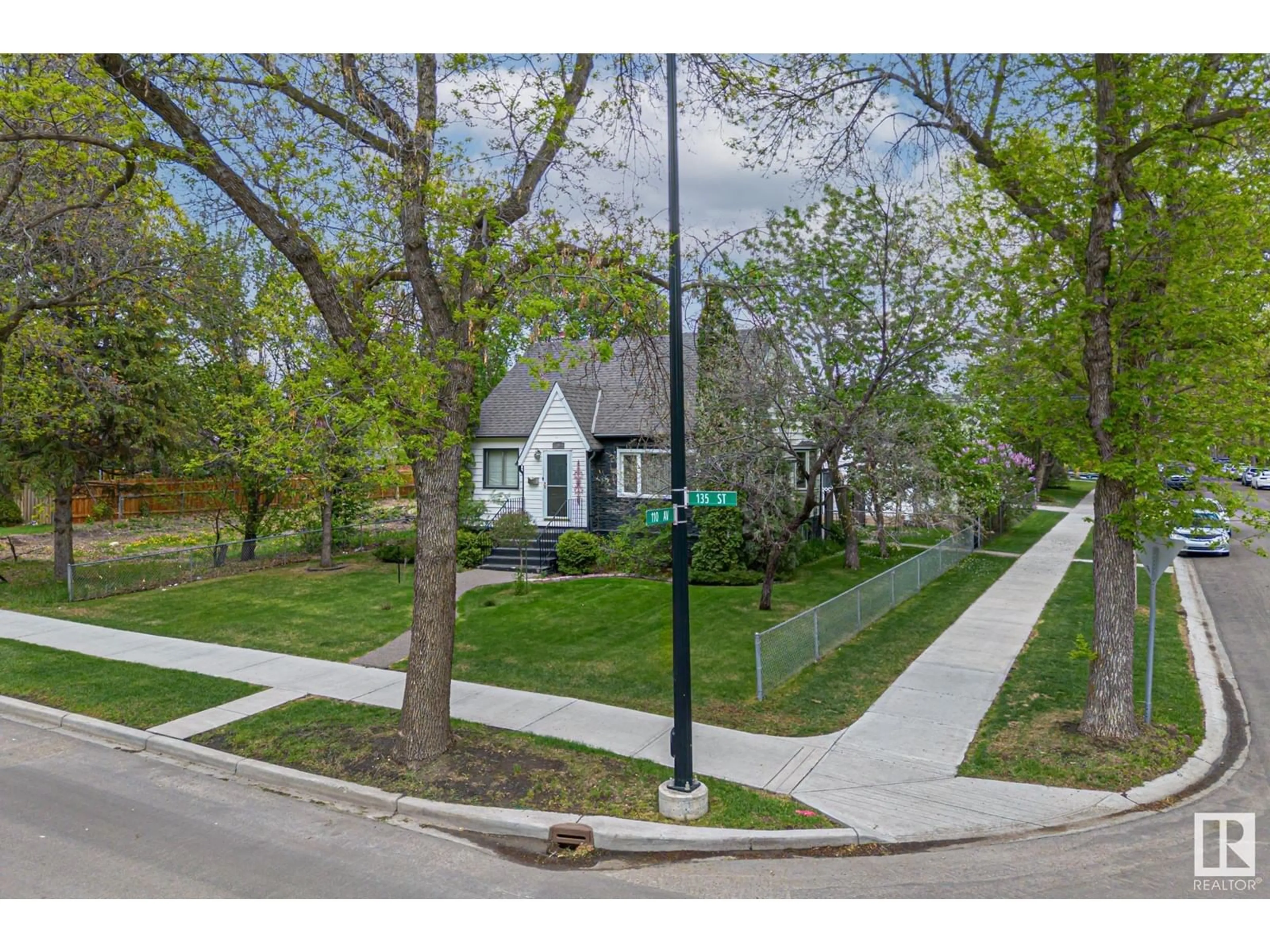 A pic from outside/outdoor area/front of a property/back of a property/a pic from drone, street for 11003 135 ST, Edmonton Alberta T5M1K4