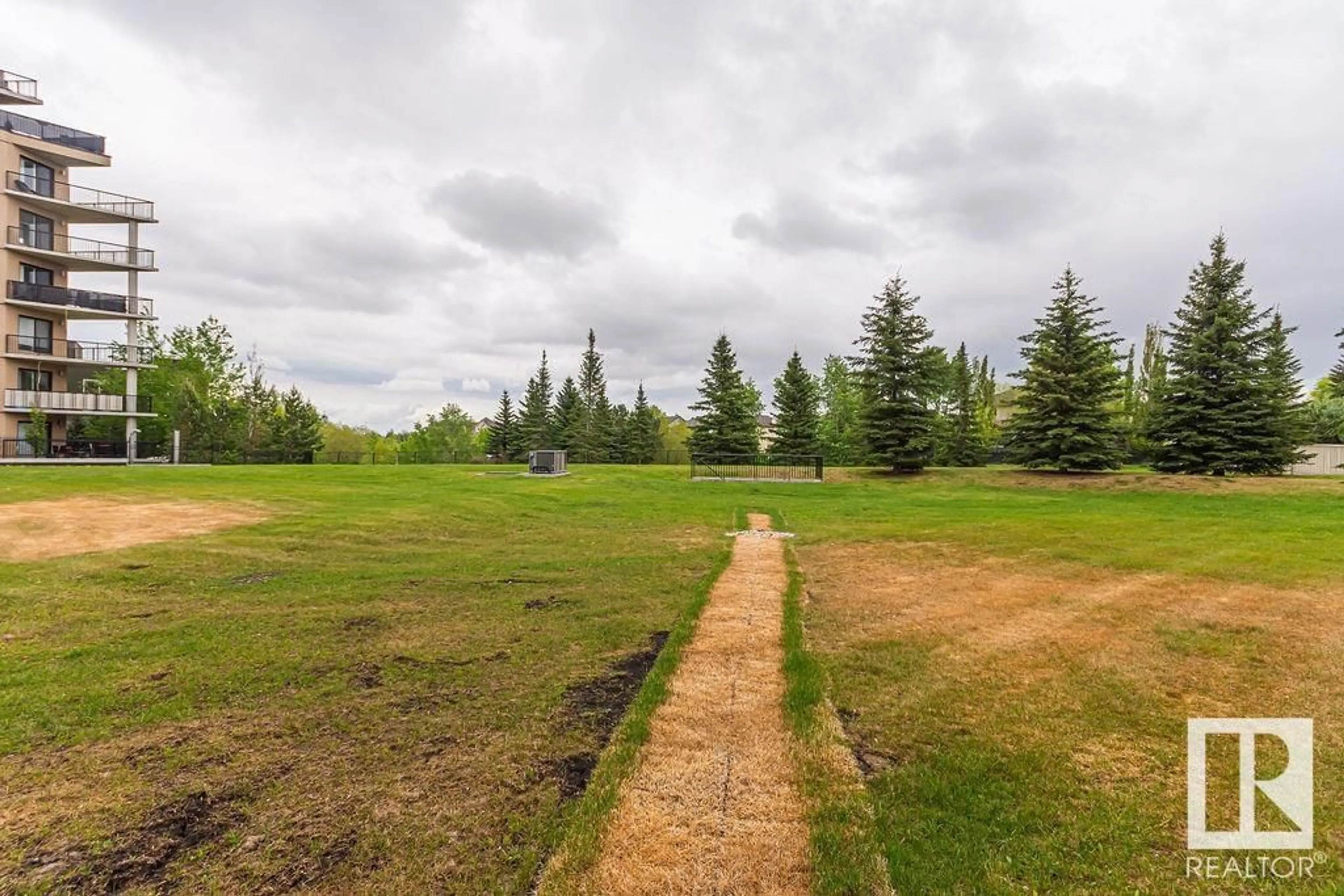 A pic from outside/outdoor area/front of a property/back of a property/a pic from drone, forest/trees view for 11453 - 311 ELLERSLIE RD SW, Edmonton Alberta T6W1T3
