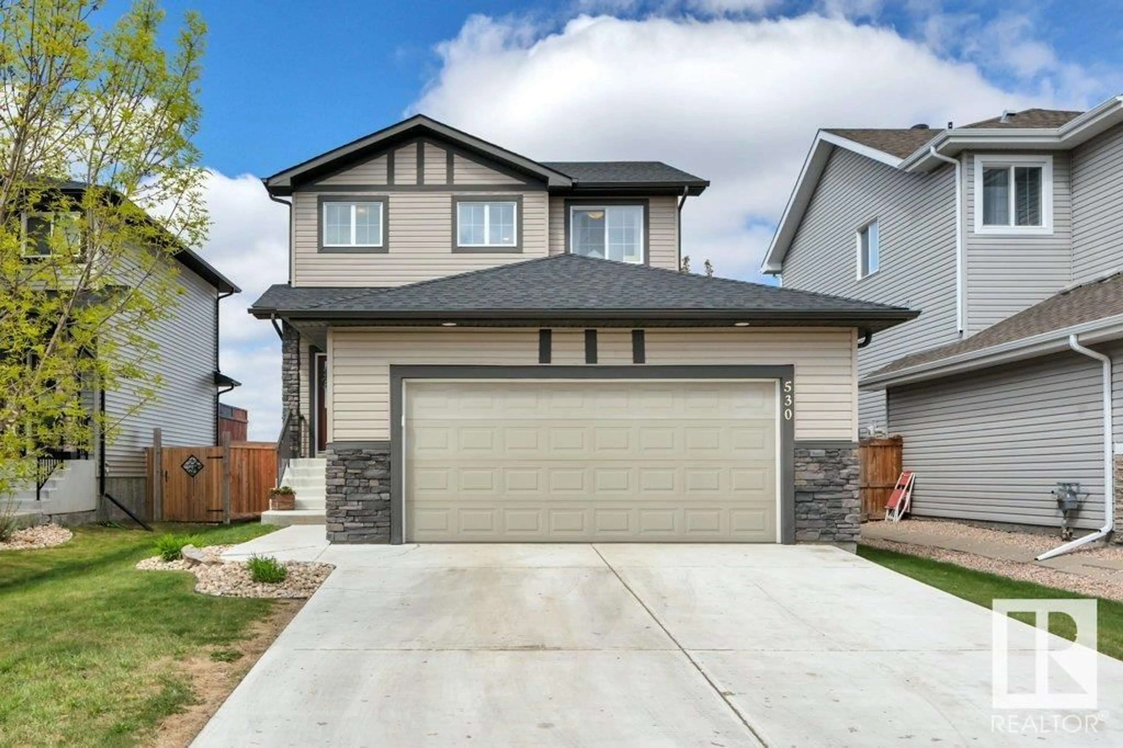 Home with vinyl exterior material, street for 530 REYNALDS WD, Leduc Alberta T9E0T2