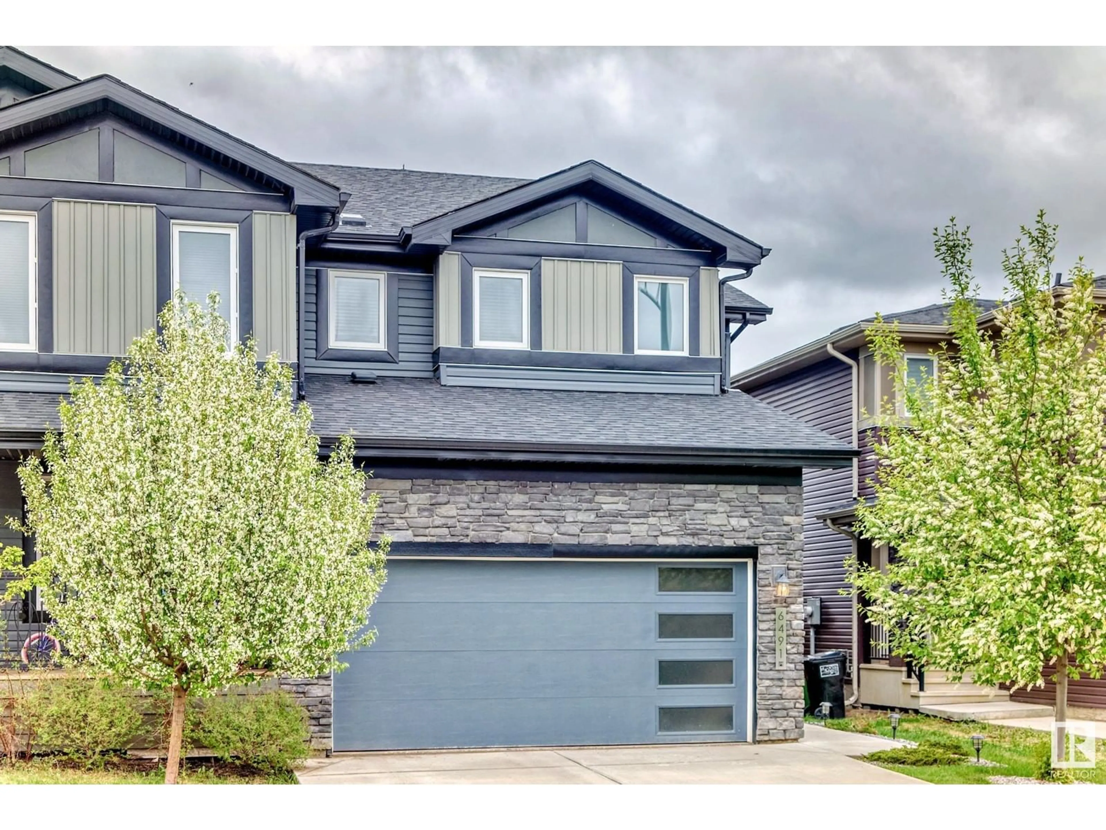 Home with brick exterior material, street for SW - 6491 KING WD, Edmonton Alberta T6W3Z9