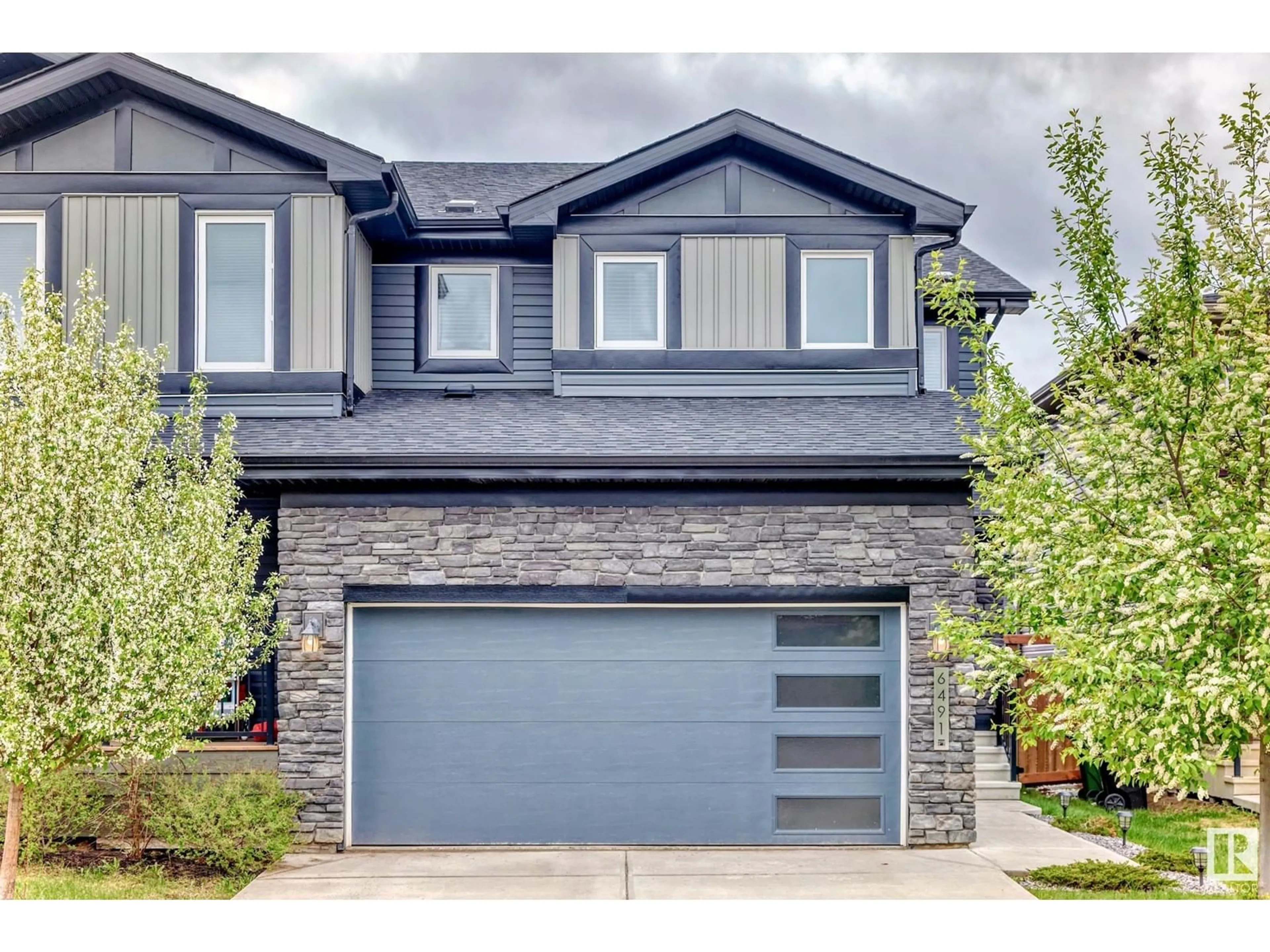 Home with brick exterior material, street for SW - 6491 KING WD, Edmonton Alberta T6W3Z9