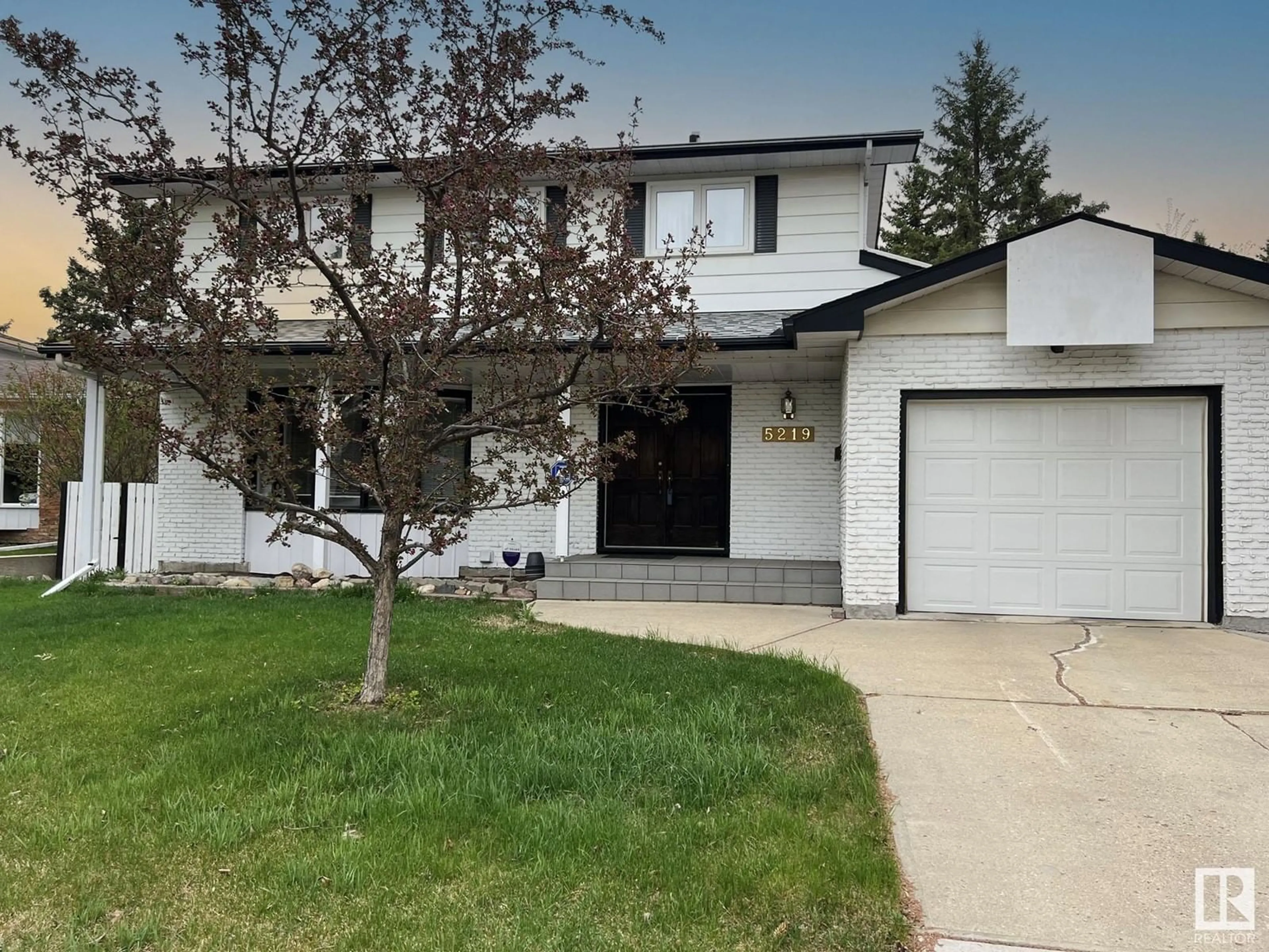 Home with vinyl exterior material, street for 5219 125 ST, Edmonton Alberta T6H3V7