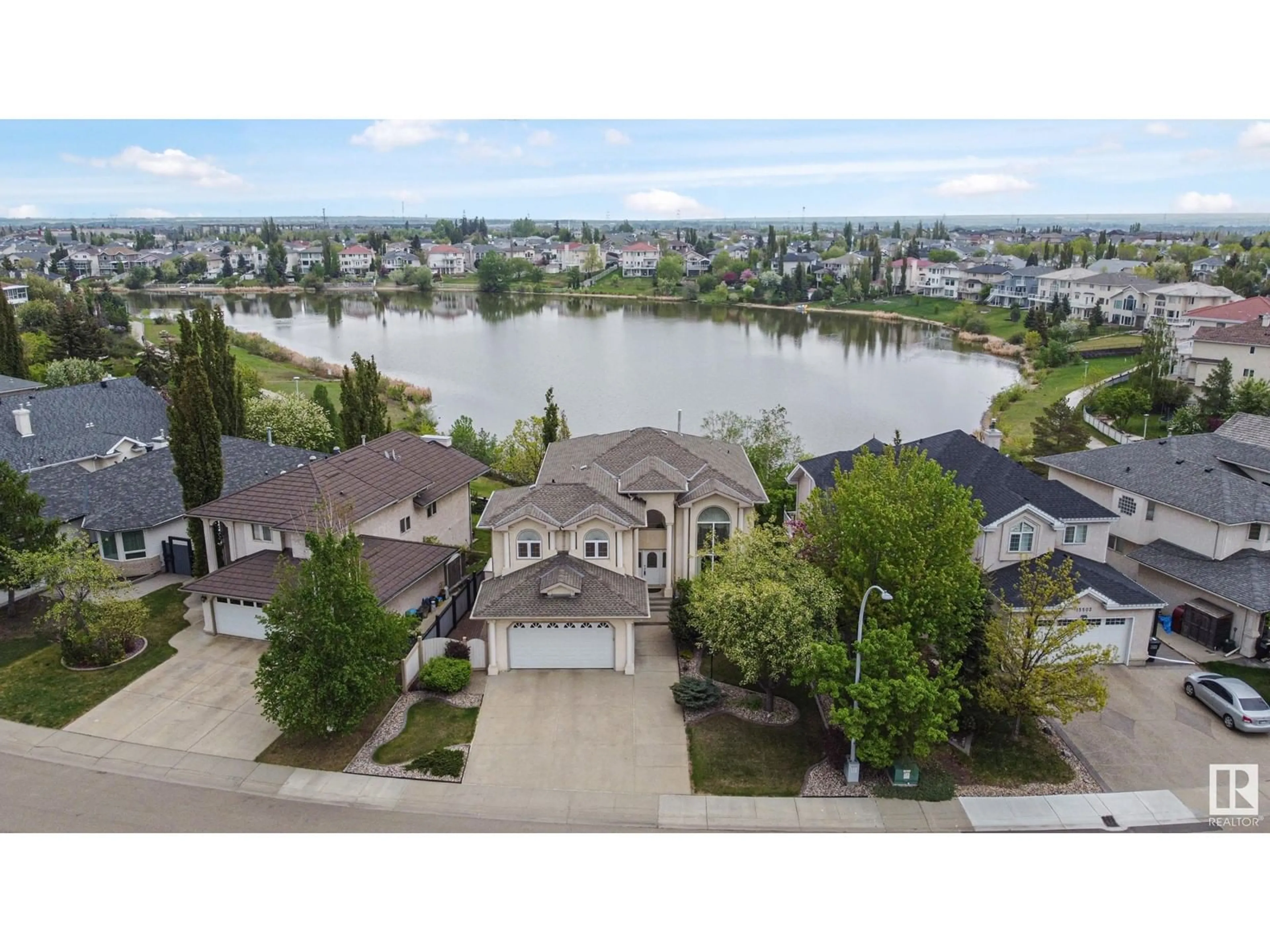 A pic from outside/outdoor area/front of a property/back of a property/a pic from drone, water/lake/river/ocean view for NW - 15507 59 ST, Edmonton Alberta T5Y2V5