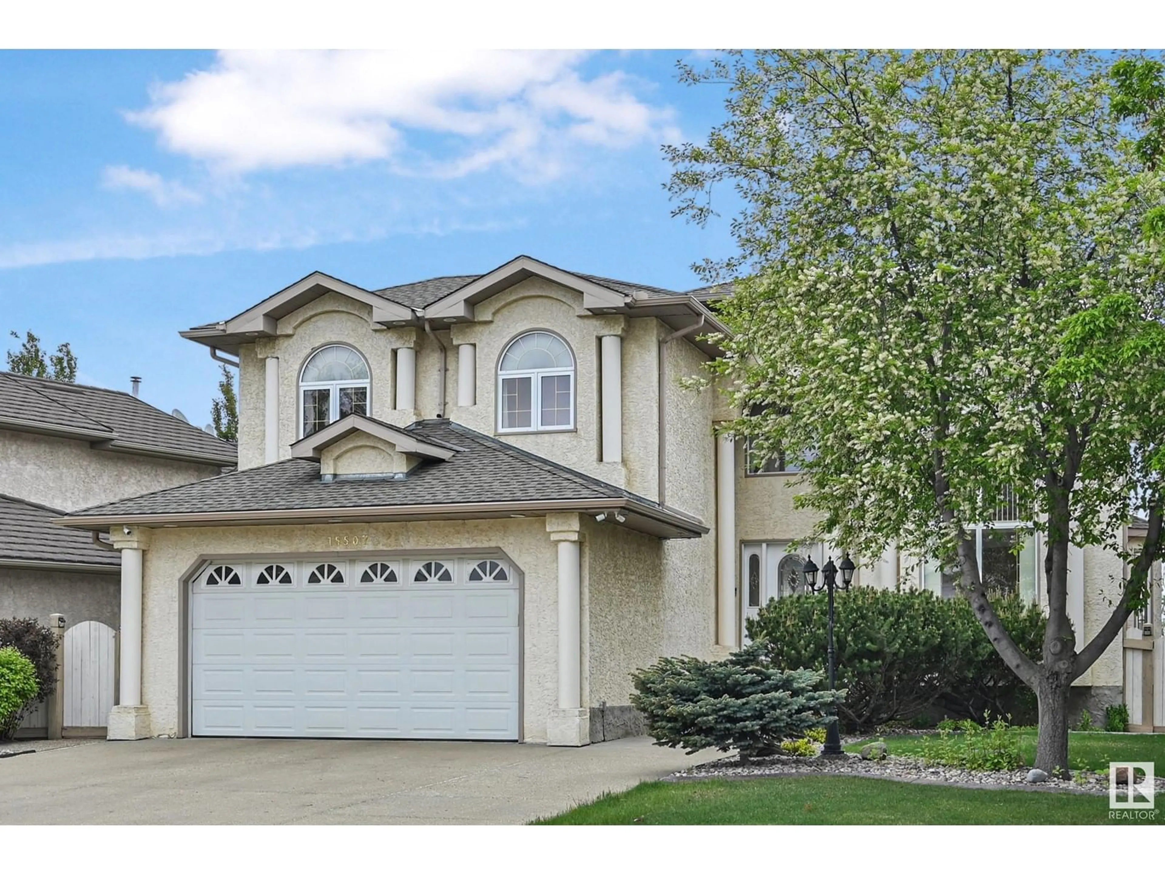 Home with vinyl exterior material, street for NW - 15507 59 ST, Edmonton Alberta T5Y2V5