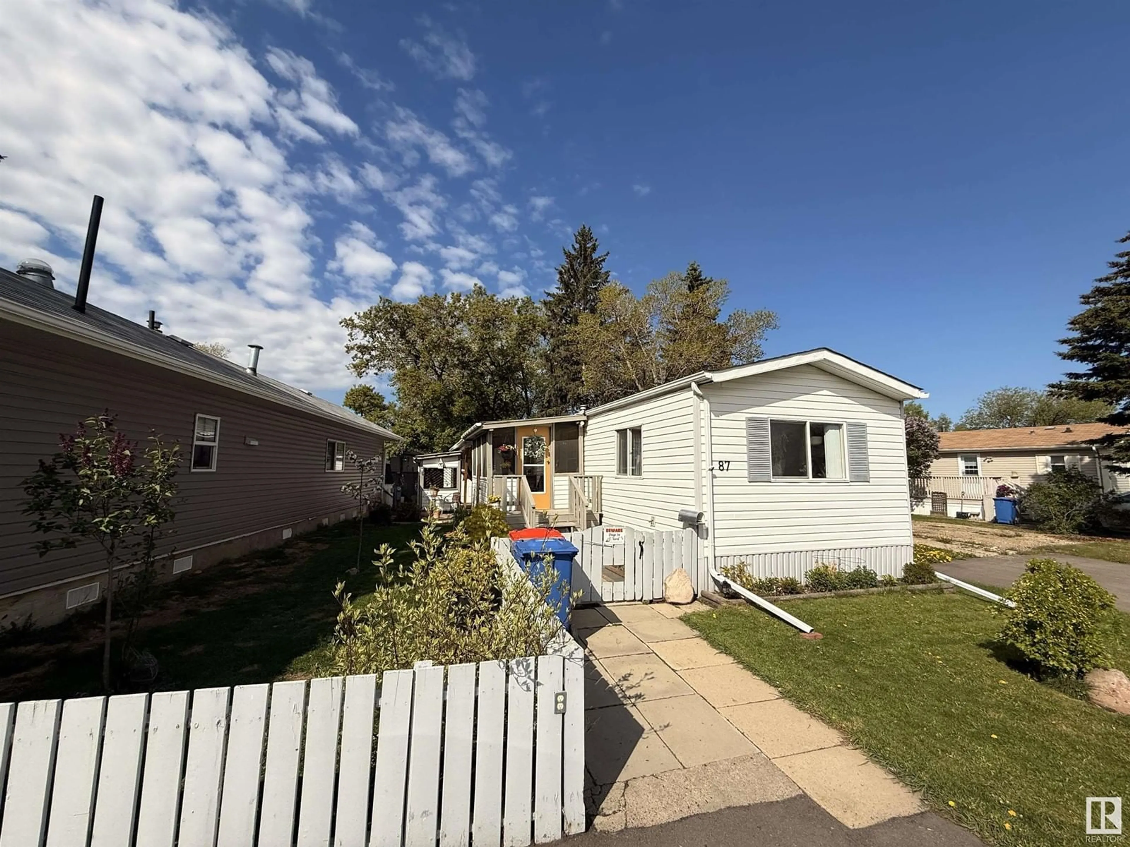 A pic from outside/outdoor area/front of a property/back of a property/a pic from drone, street for 87 WILLOW PARK ESATES, Leduc Alberta T9E5H6