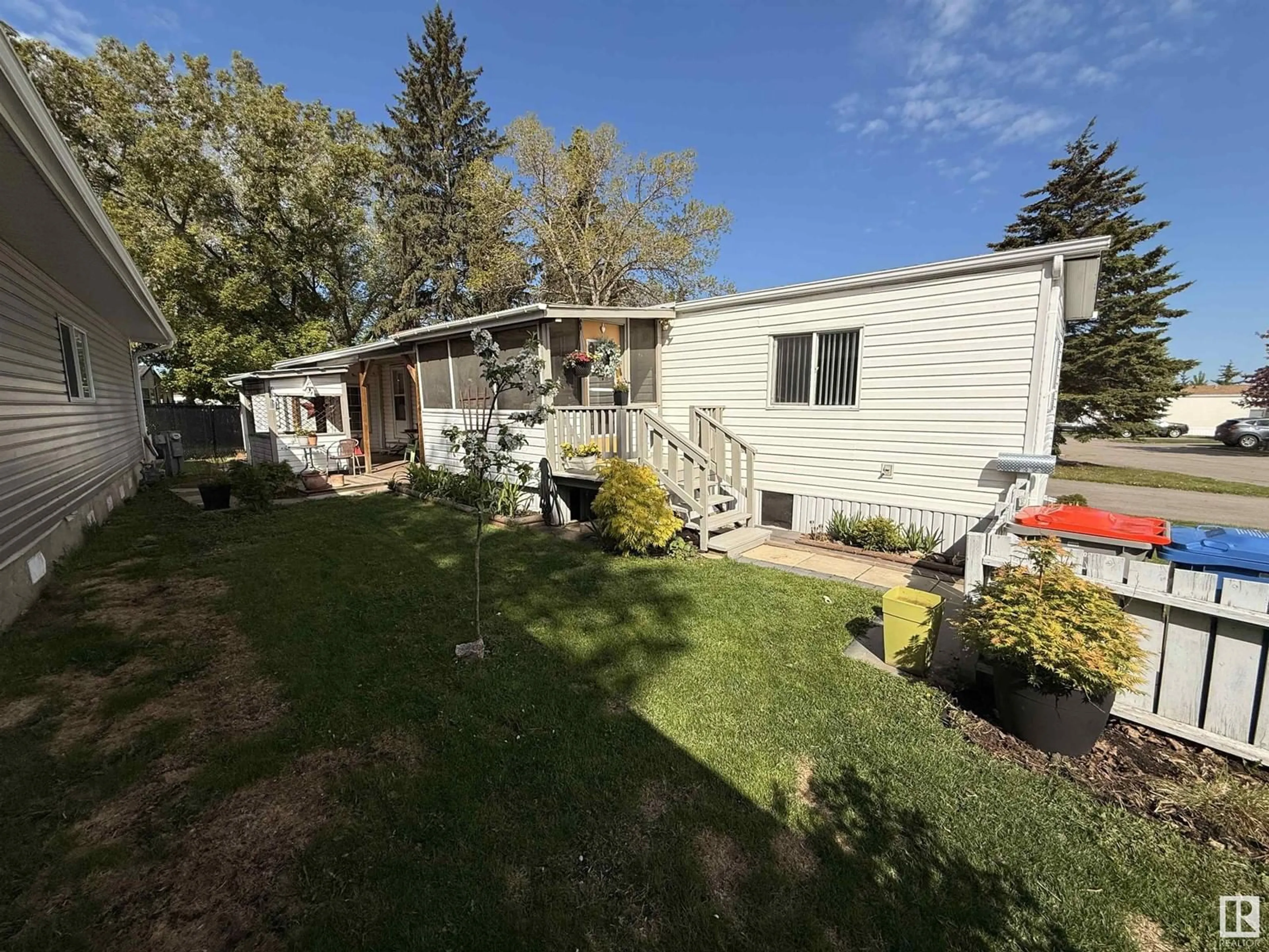A pic from outside/outdoor area/front of a property/back of a property/a pic from drone, unknown for 87 WILLOW PARK ESATES, Leduc Alberta T9E5H6