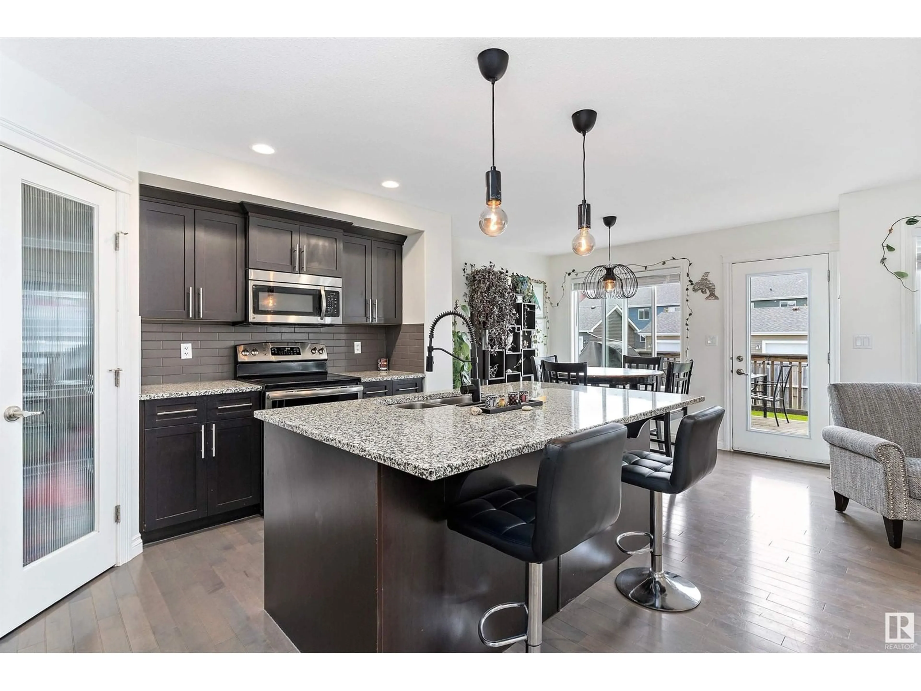 Open concept kitchen, ceramic/tile floor for 477 REED CR, Leduc Alberta T9E0R5