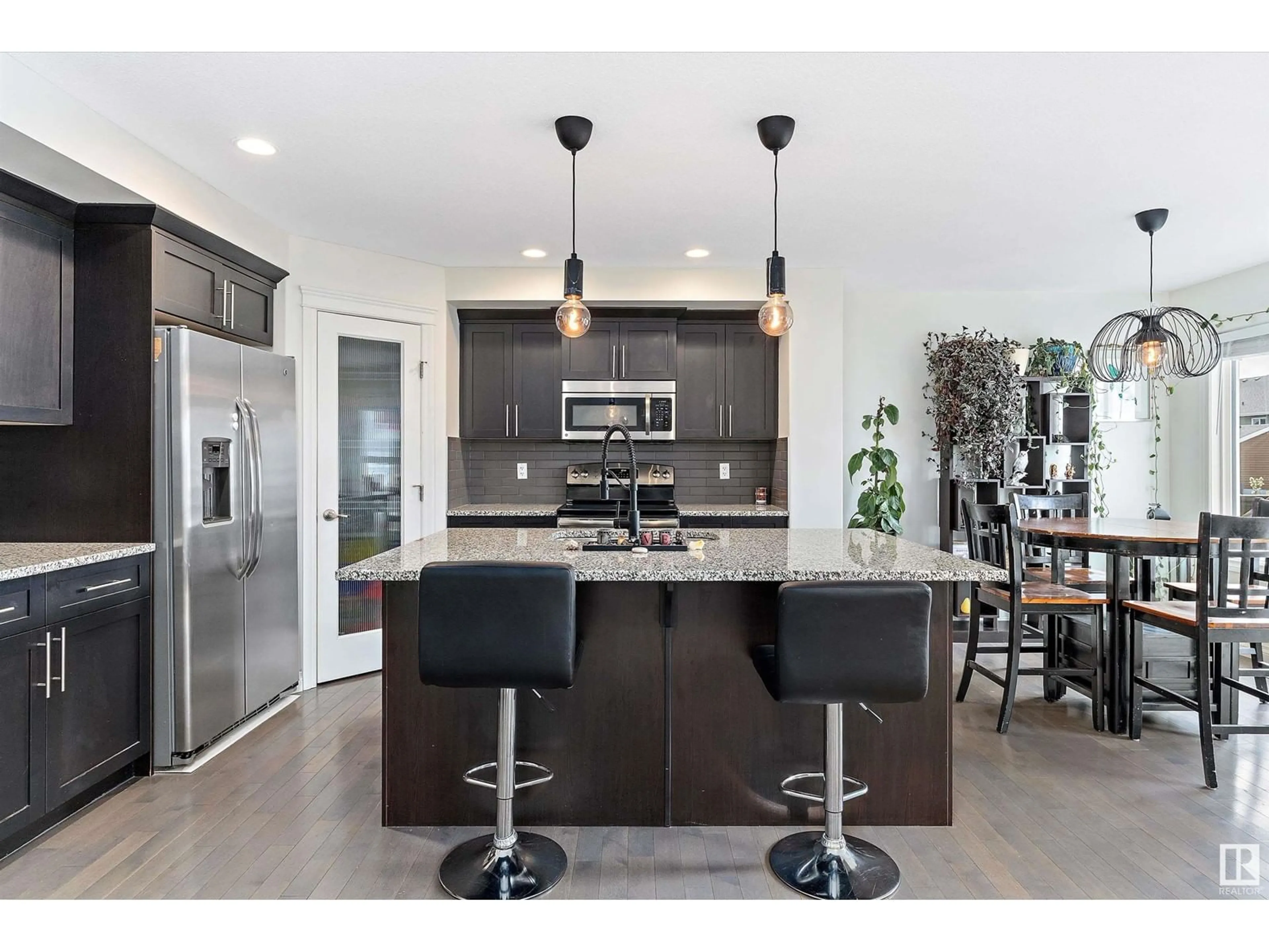 Open concept kitchen, ceramic/tile floor for 477 REED CR, Leduc Alberta T9E0R5