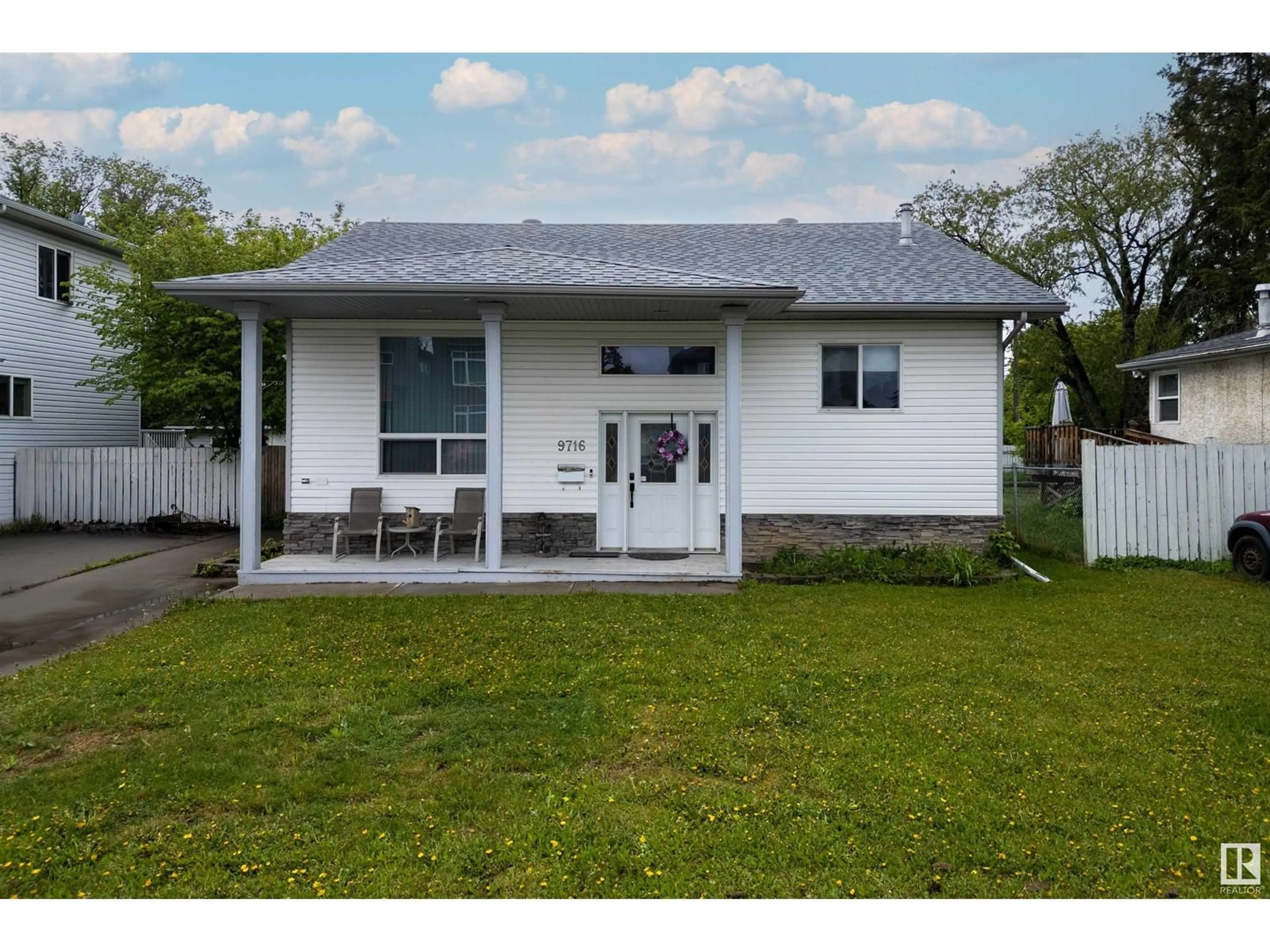 Home with vinyl exterior material, street for NW - 9716 160 ST, Edmonton Alberta T5P3C8