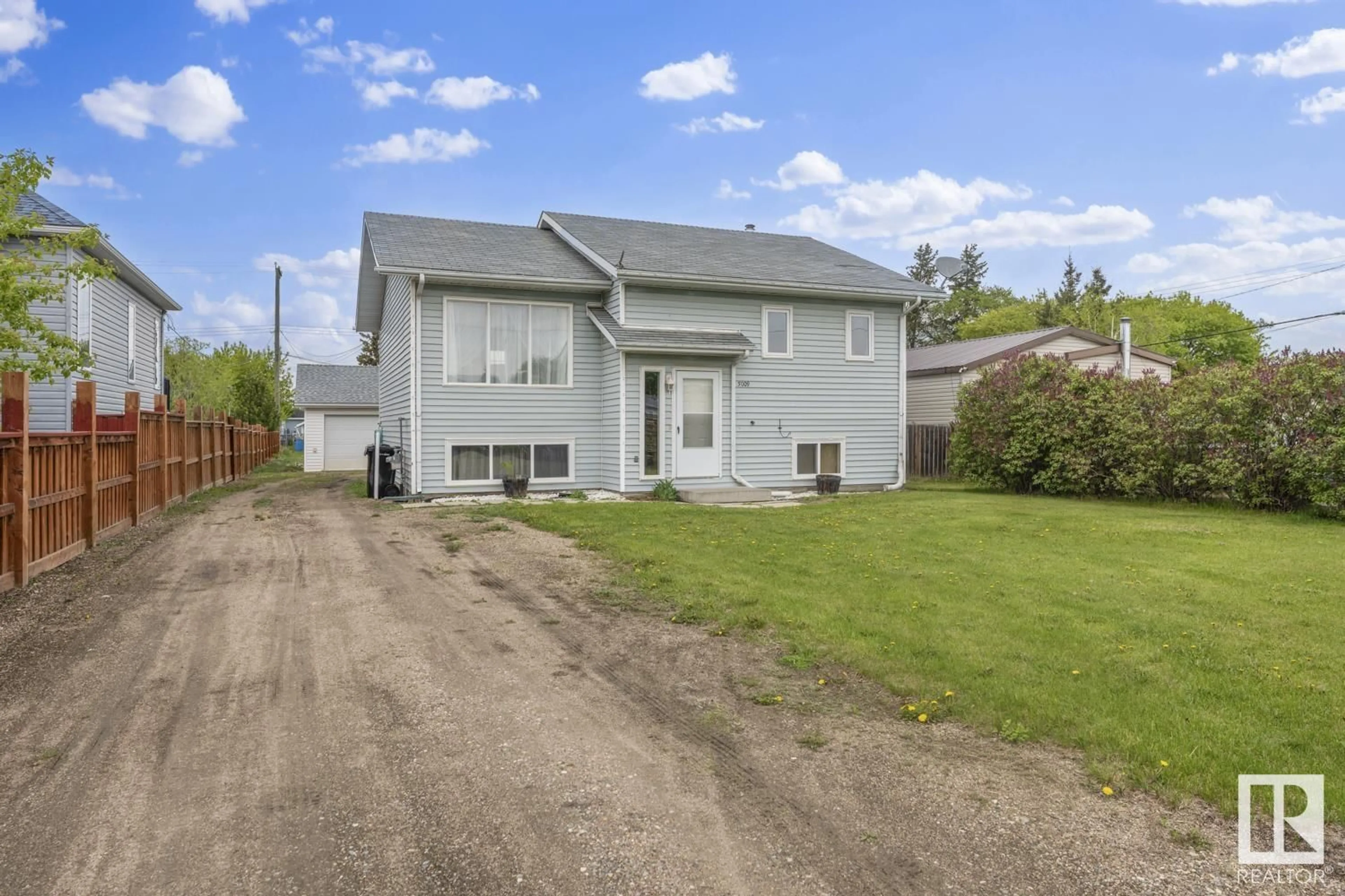A pic from outside/outdoor area/front of a property/back of a property/a pic from drone, street for 5009 48 AV, Fort Kent Alberta T0A1H0