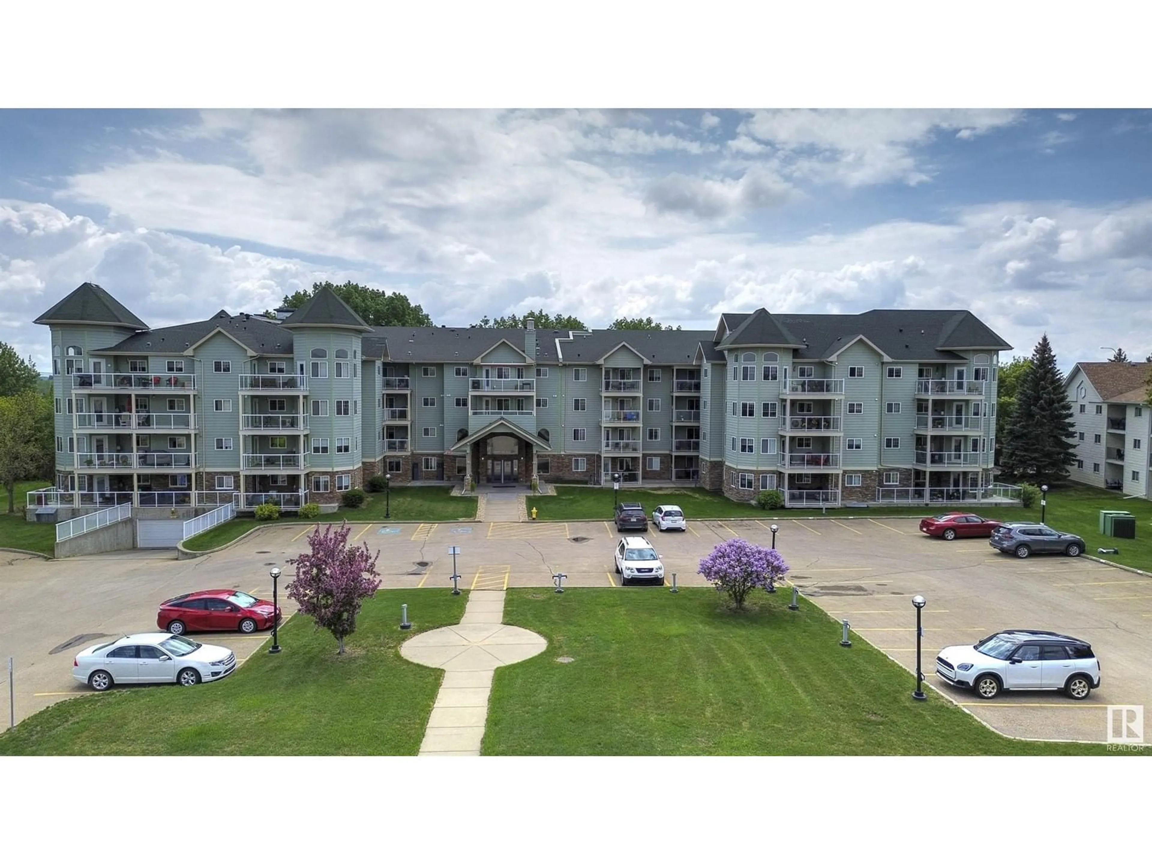 A pic from outside/outdoor area/front of a property/back of a property/a pic from drone, unknown for #305 - 9995 93 AV, Fort Saskatchewan Alberta T8L1N5