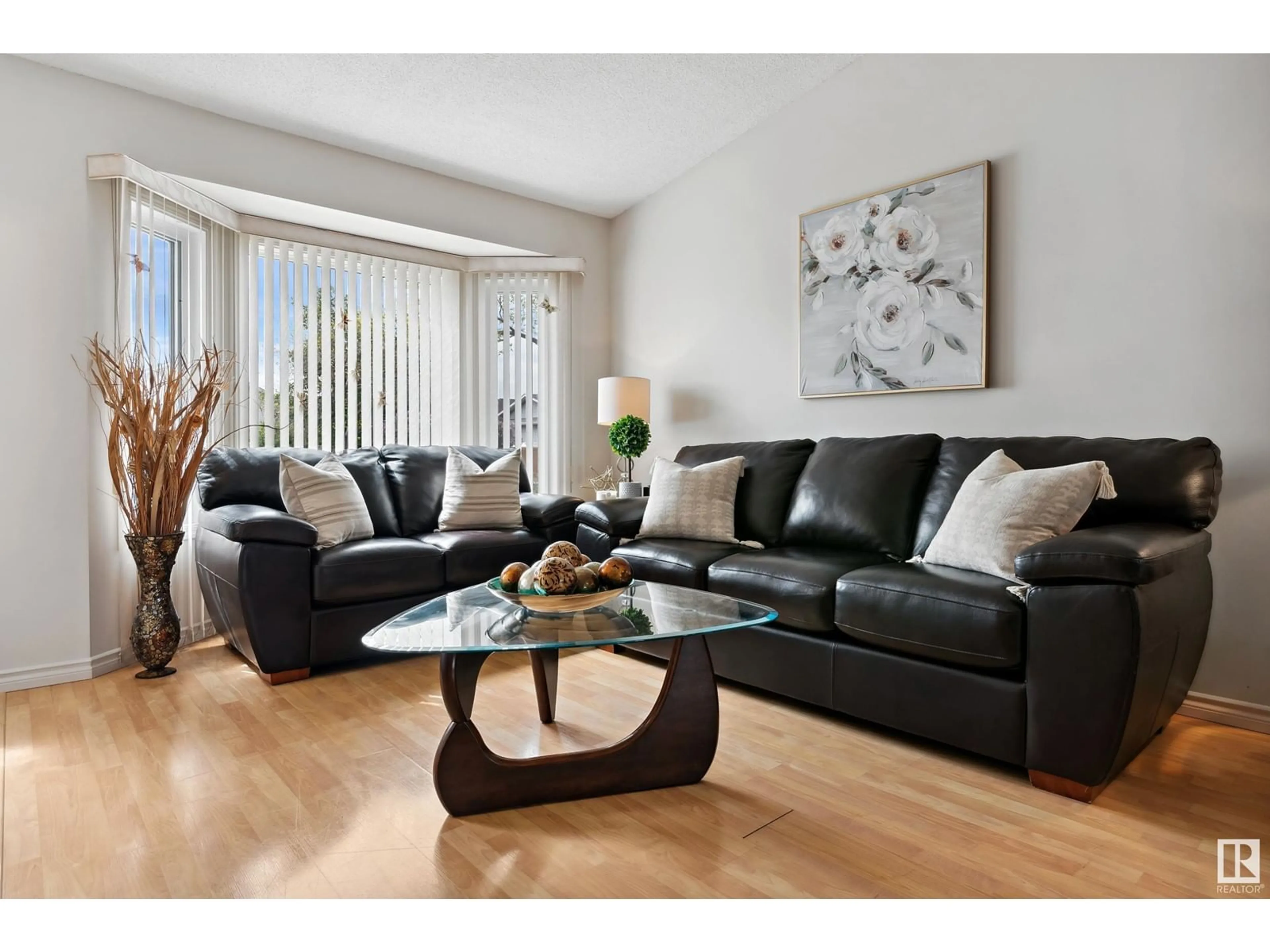 Living room with furniture, wood/laminate floor for 16 CIMMARON WY, Sherwood Park Alberta T8H1C7