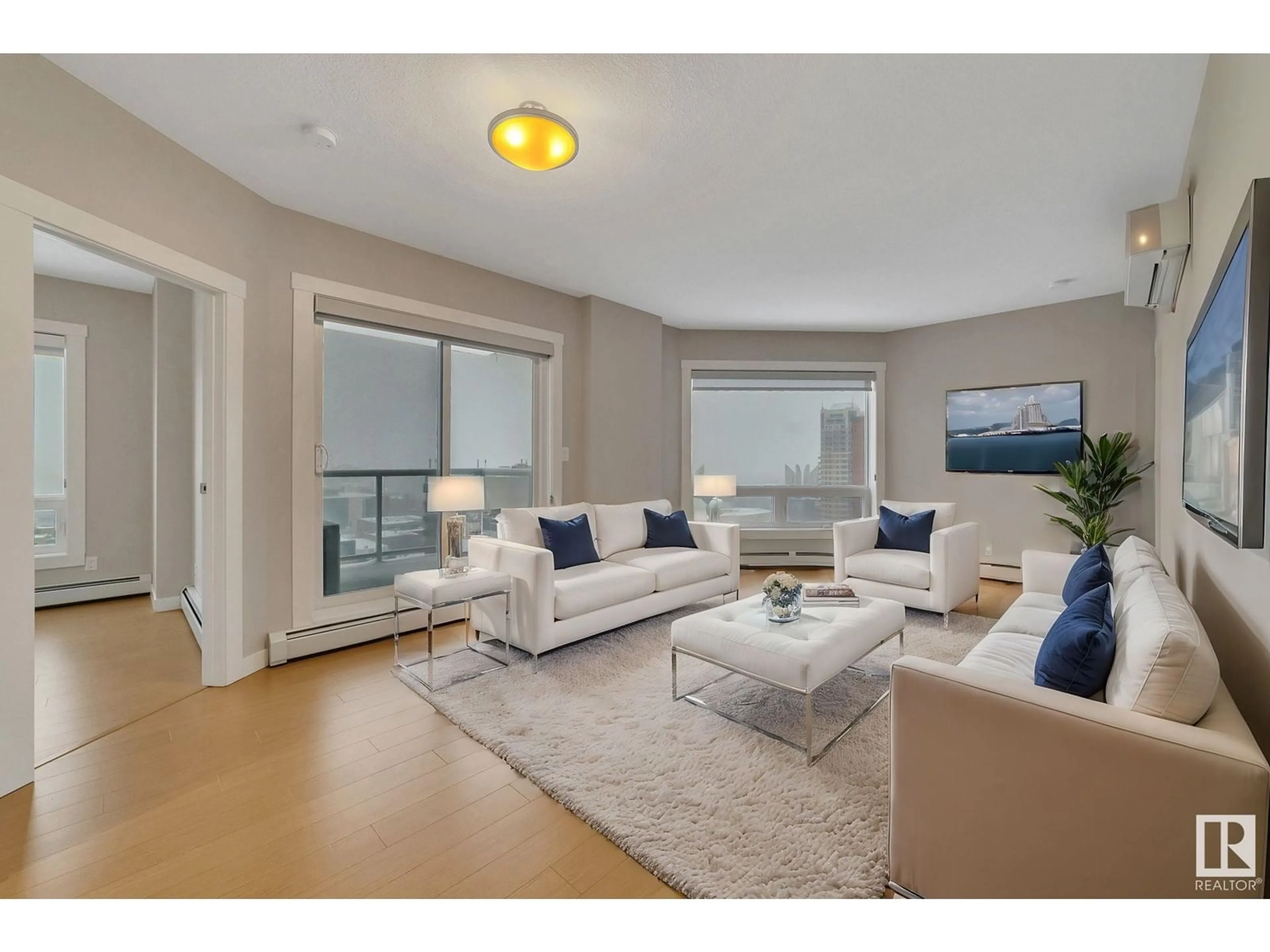 Living room with furniture, unknown for 1106 - 10410 102 AV NW, Edmonton Alberta T5J0E9