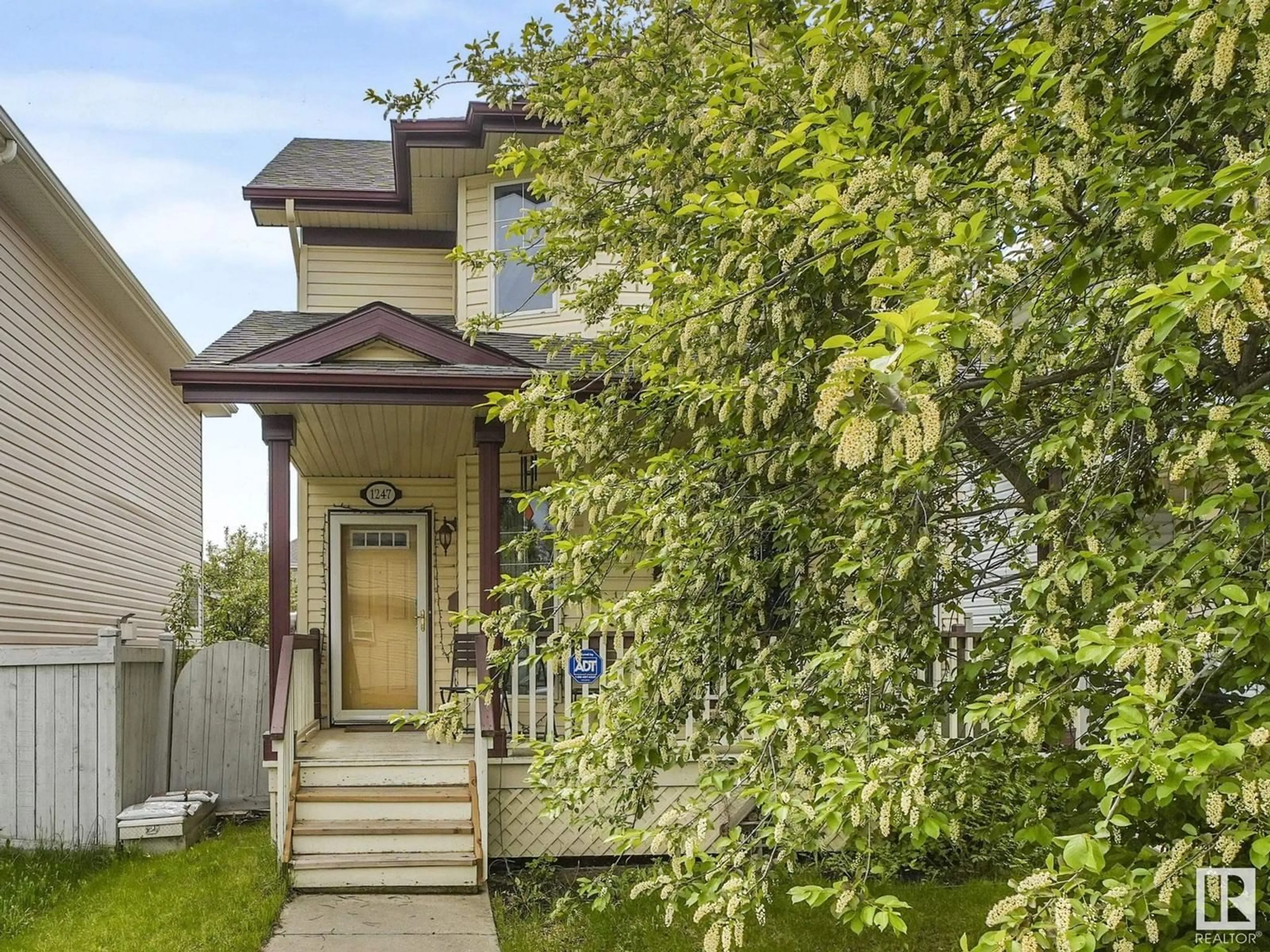 Home with vinyl exterior material, street for 1247 GILLESPIE CR, Edmonton Alberta T5T6M6