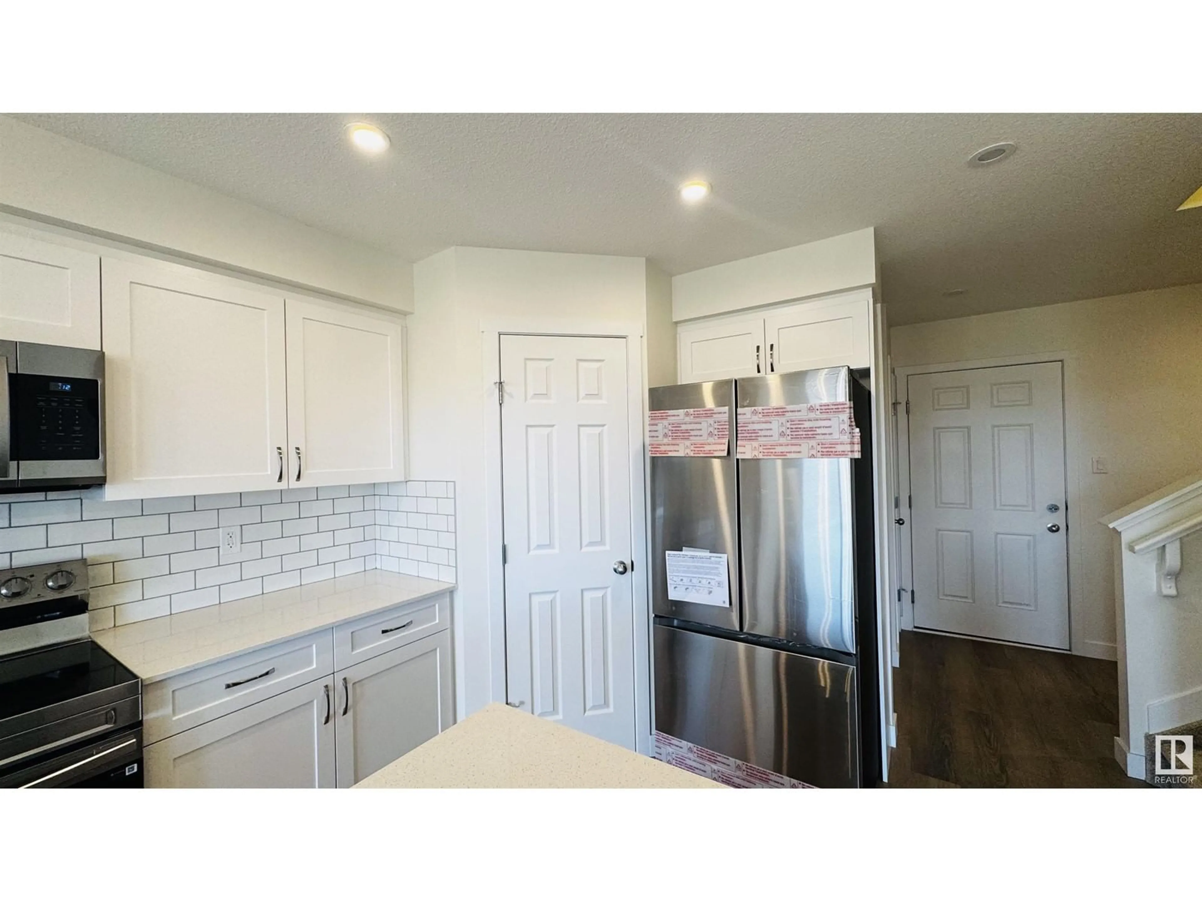 Open concept kitchen, unknown for 19130 29 AV, Edmonton Alberta T6M3B5