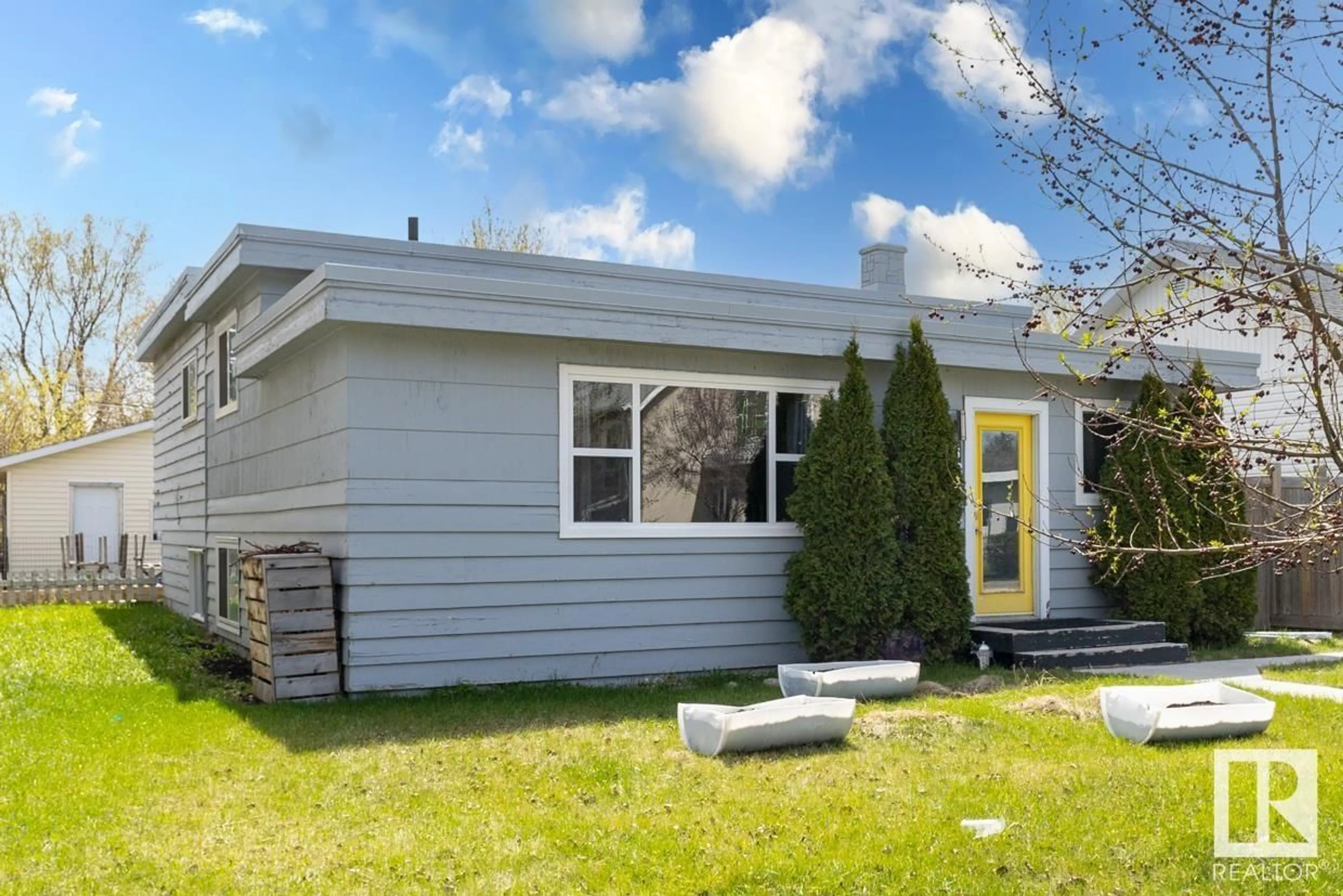 Home with vinyl exterior material, street for 10673 62 AV, Edmonton Alberta T6H1M7