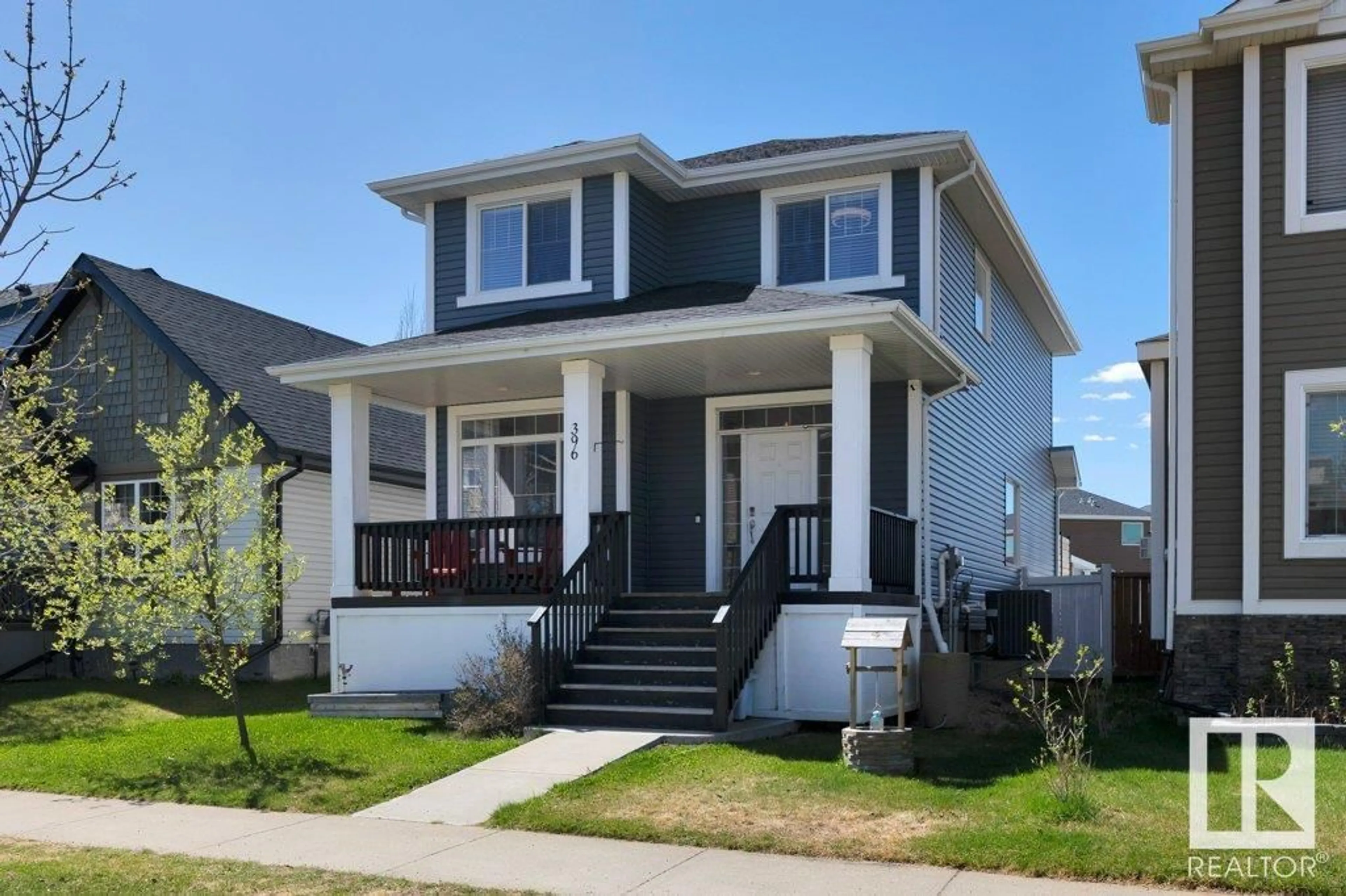 Home with vinyl exterior material, street for 396 SOUTHFORK DR, Leduc Alberta T9E0E6