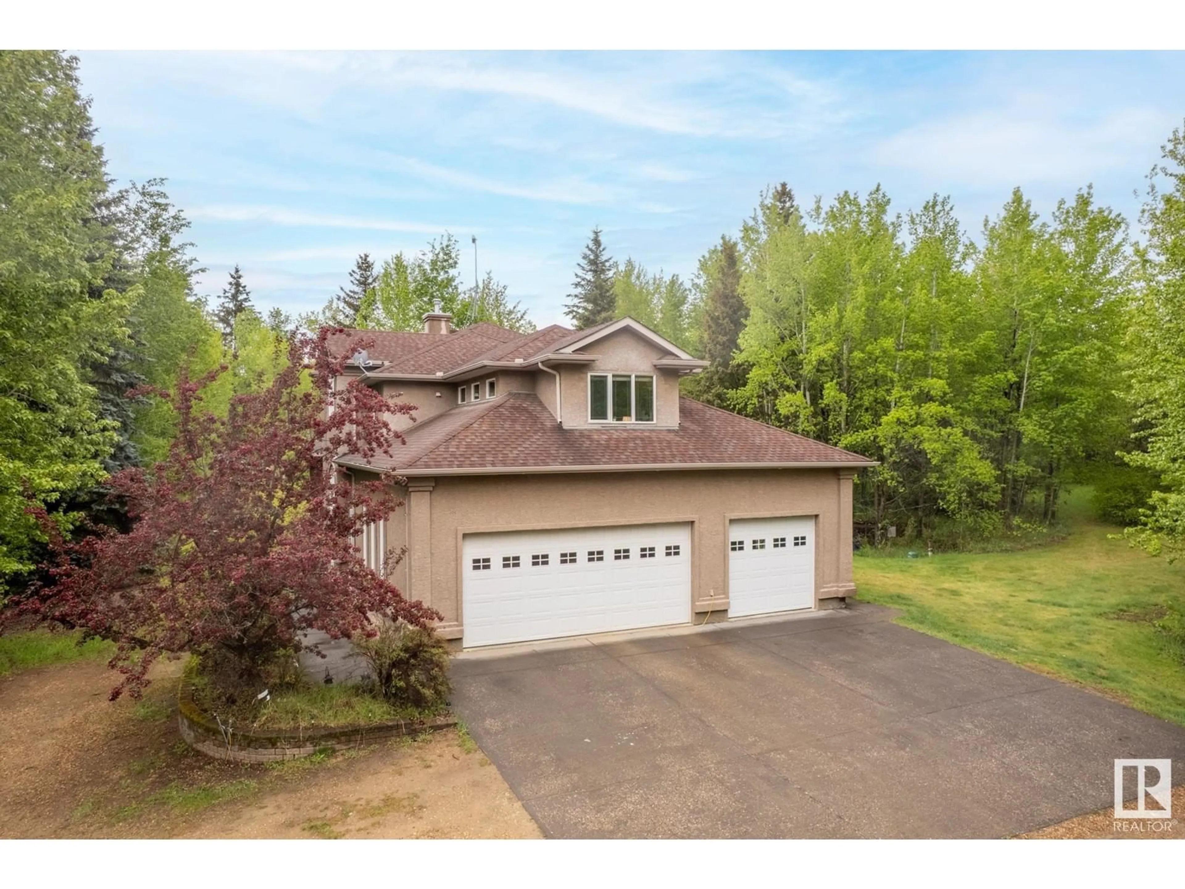 A pic from outside/outdoor area/front of a property/back of a property/a pic from drone, unknown for 26516 - 32 TWP ROAD 514, Rural Parkland County Alberta T7Y1E9