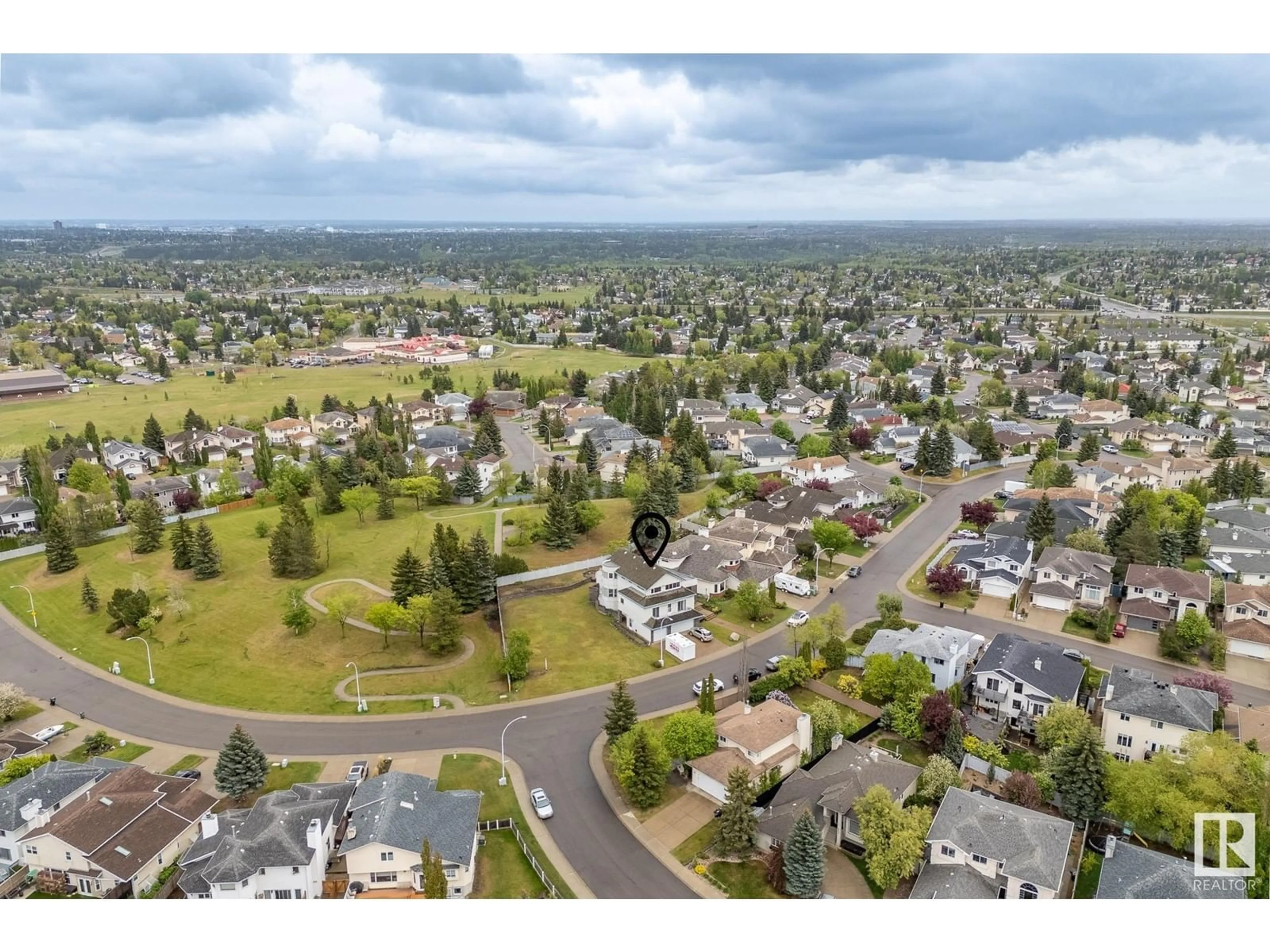 A pic from outside/outdoor area/front of a property/back of a property/a pic from drone, mountain view for 333 REEVES WY, Edmonton Alberta T6R2B9