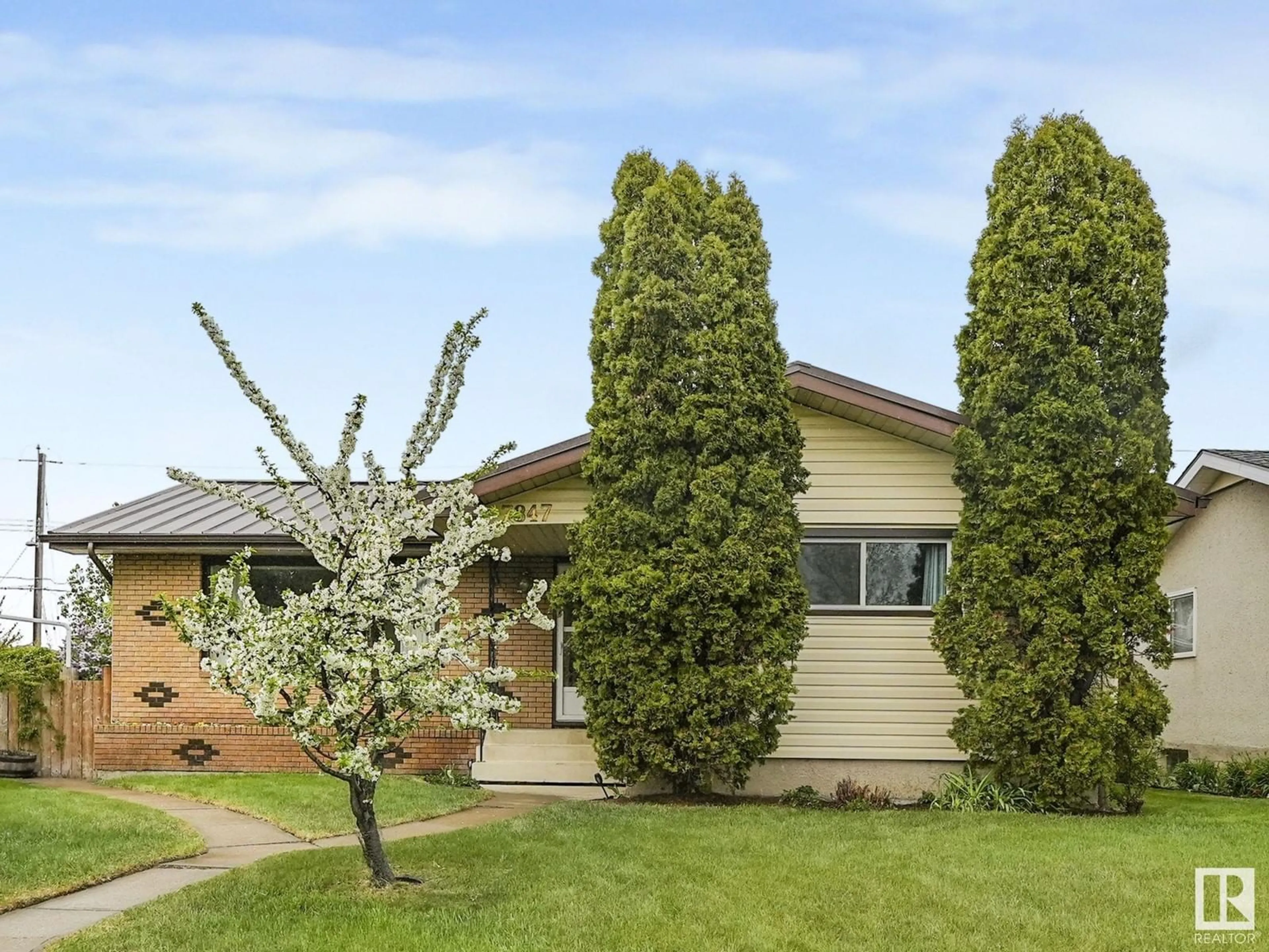 Home with vinyl exterior material, street for NW - 7847 135A AV, Edmonton Alberta T5C2J4