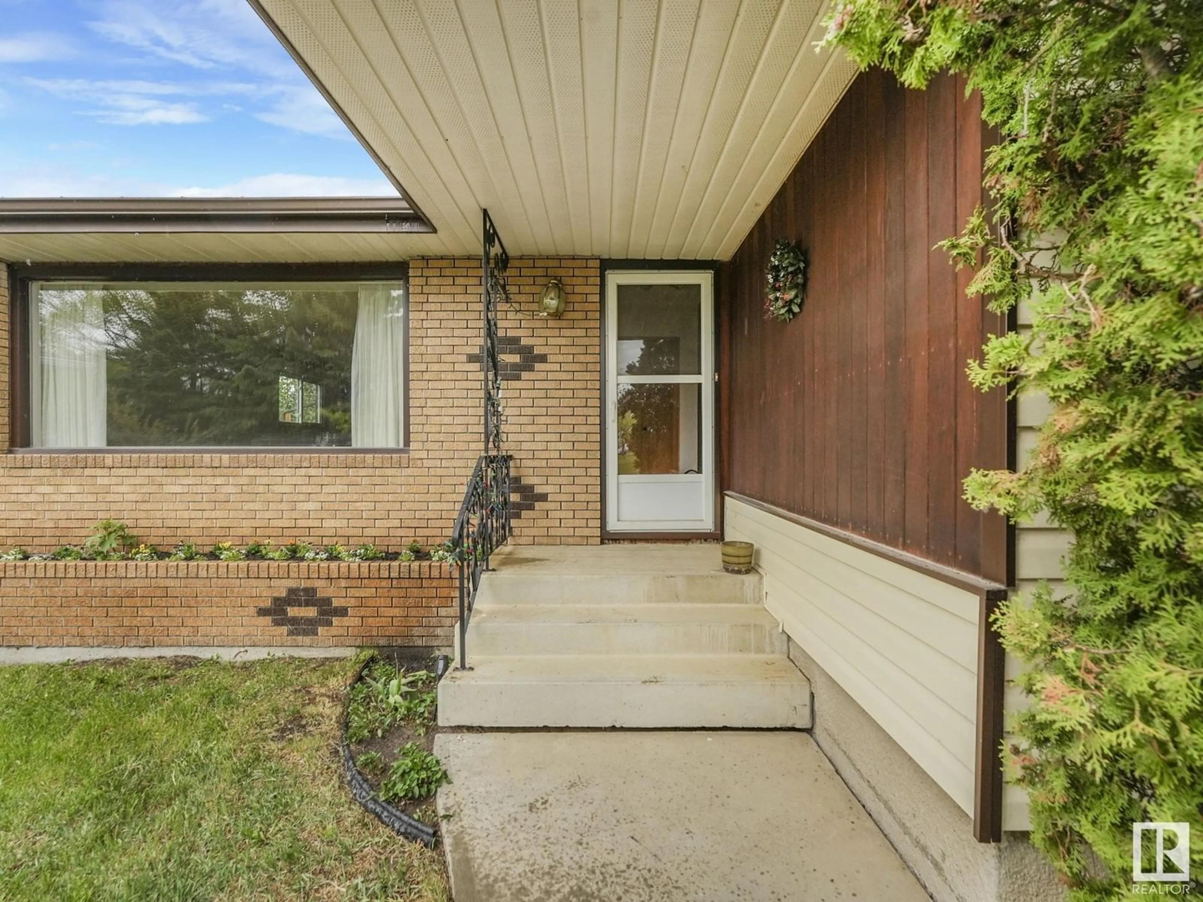 Home with brick exterior material, street for NW - 7847 135A AV, Edmonton Alberta T5C2J4