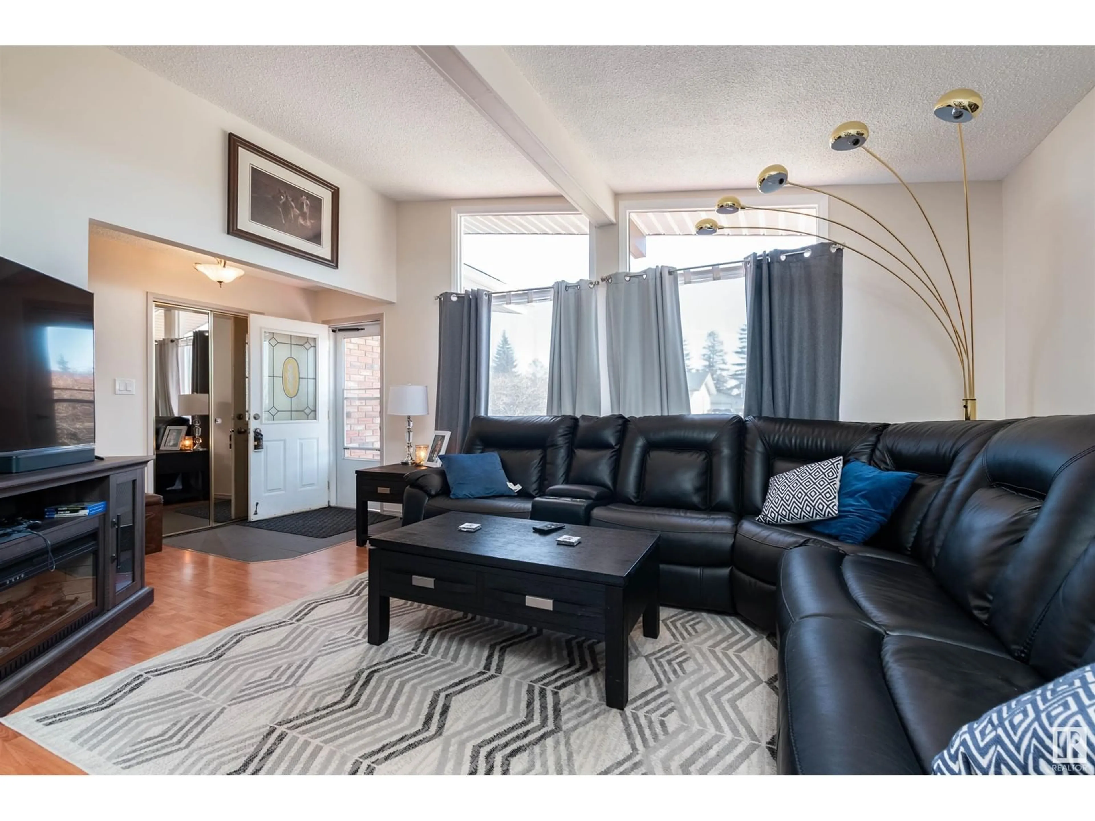 Living room with furniture, unknown for NW - 15712 114 ST, Edmonton Alberta T5X2M1