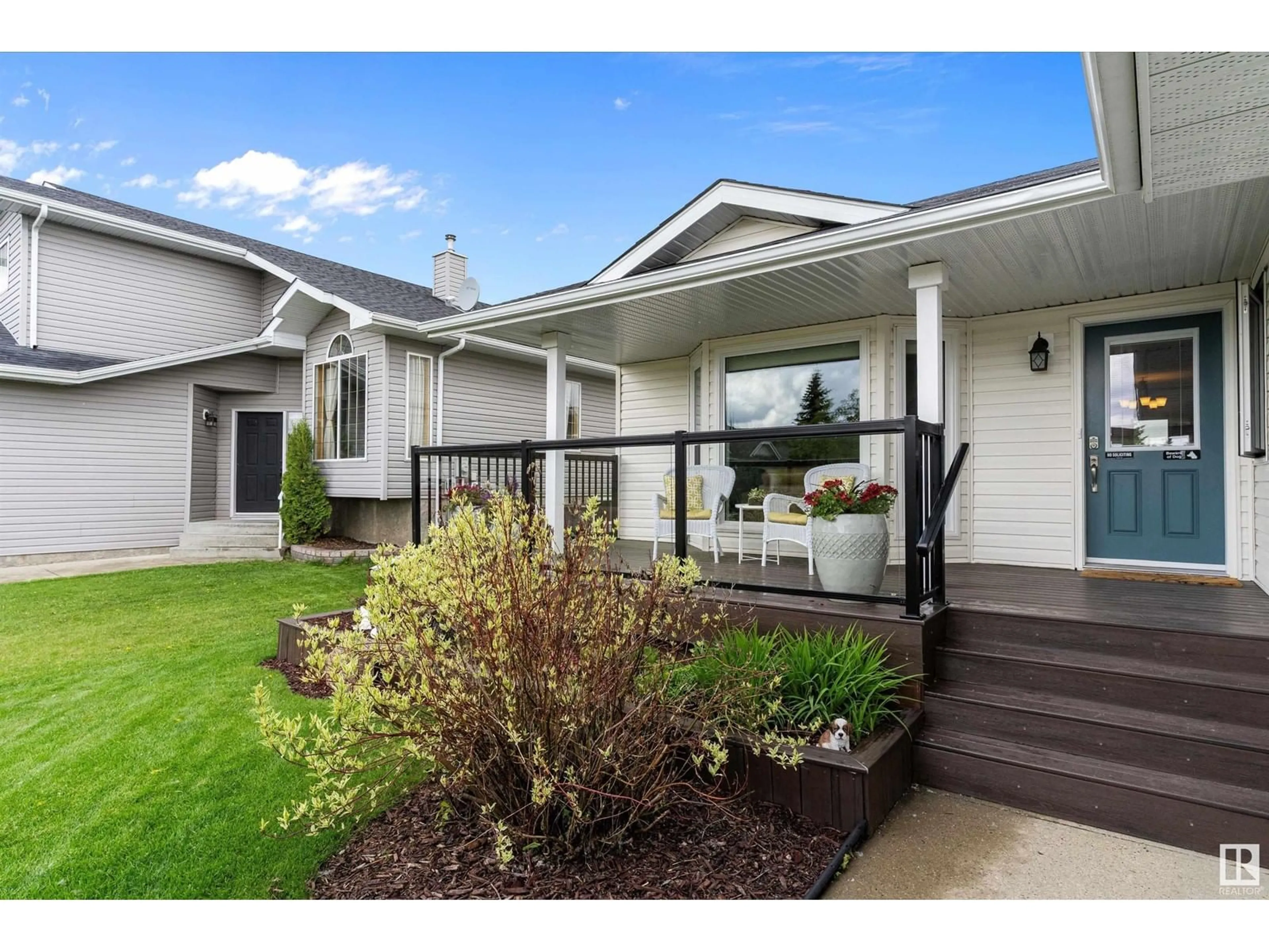 Home with vinyl exterior material, street for 121 PIPESTONE DR, Millet Alberta T0C1Z0