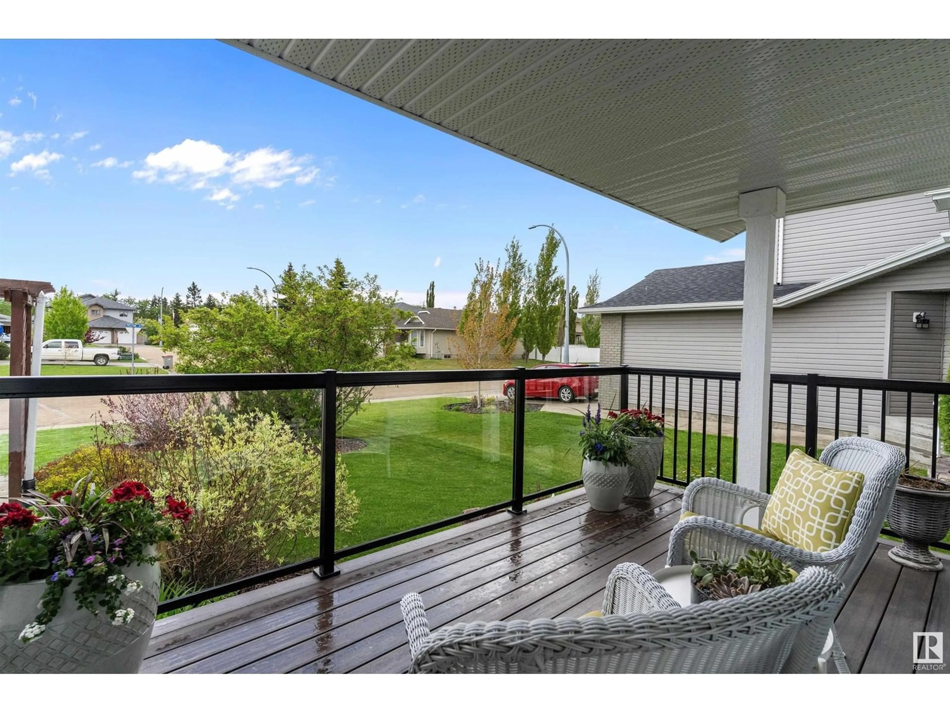 Patio, water/lake/river/ocean view for 121 PIPESTONE DR, Millet Alberta T0C1Z0