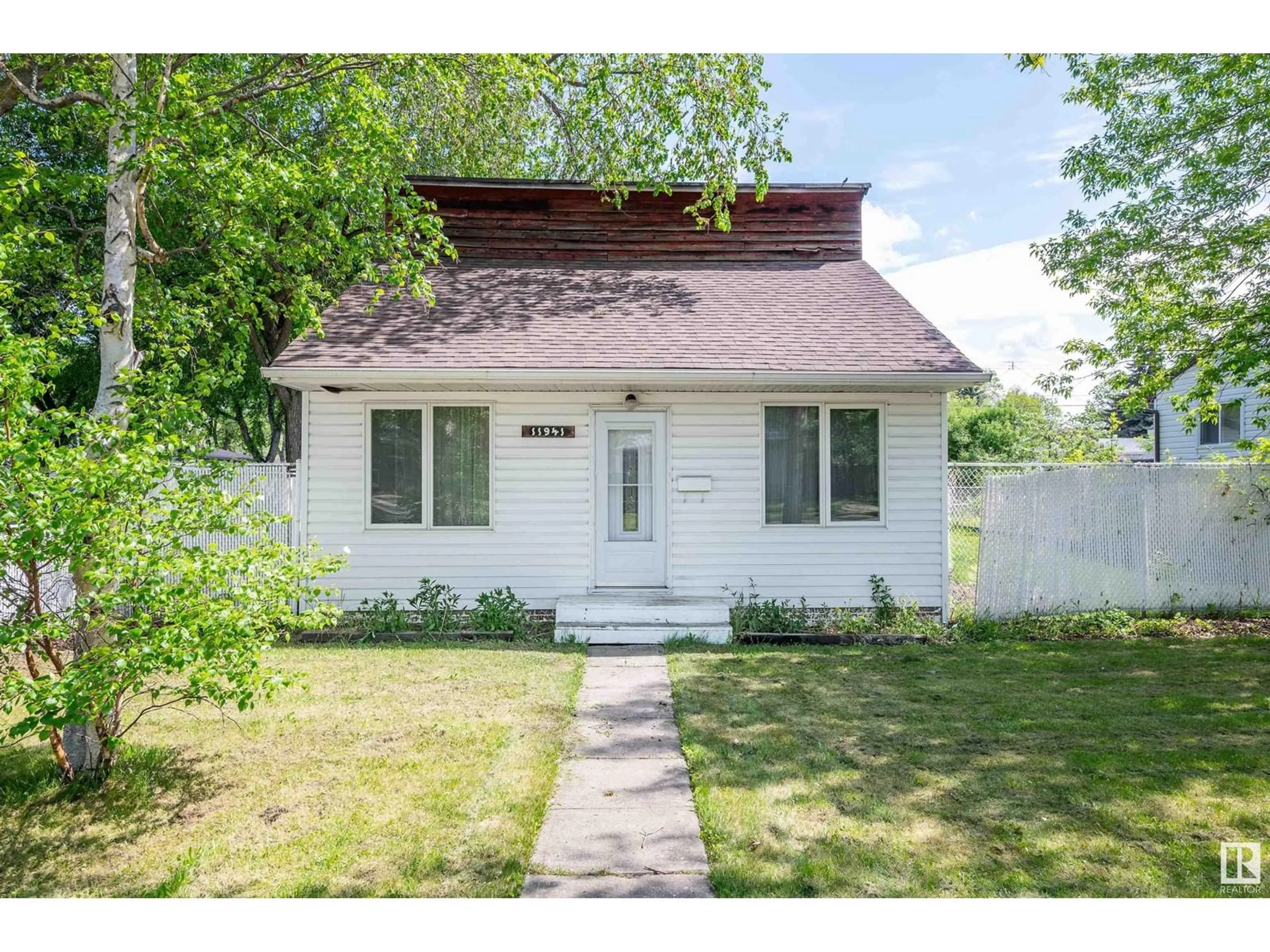 Home with vinyl exterior material, street for NW - 11941 45 ST, Edmonton Alberta T5W2T5