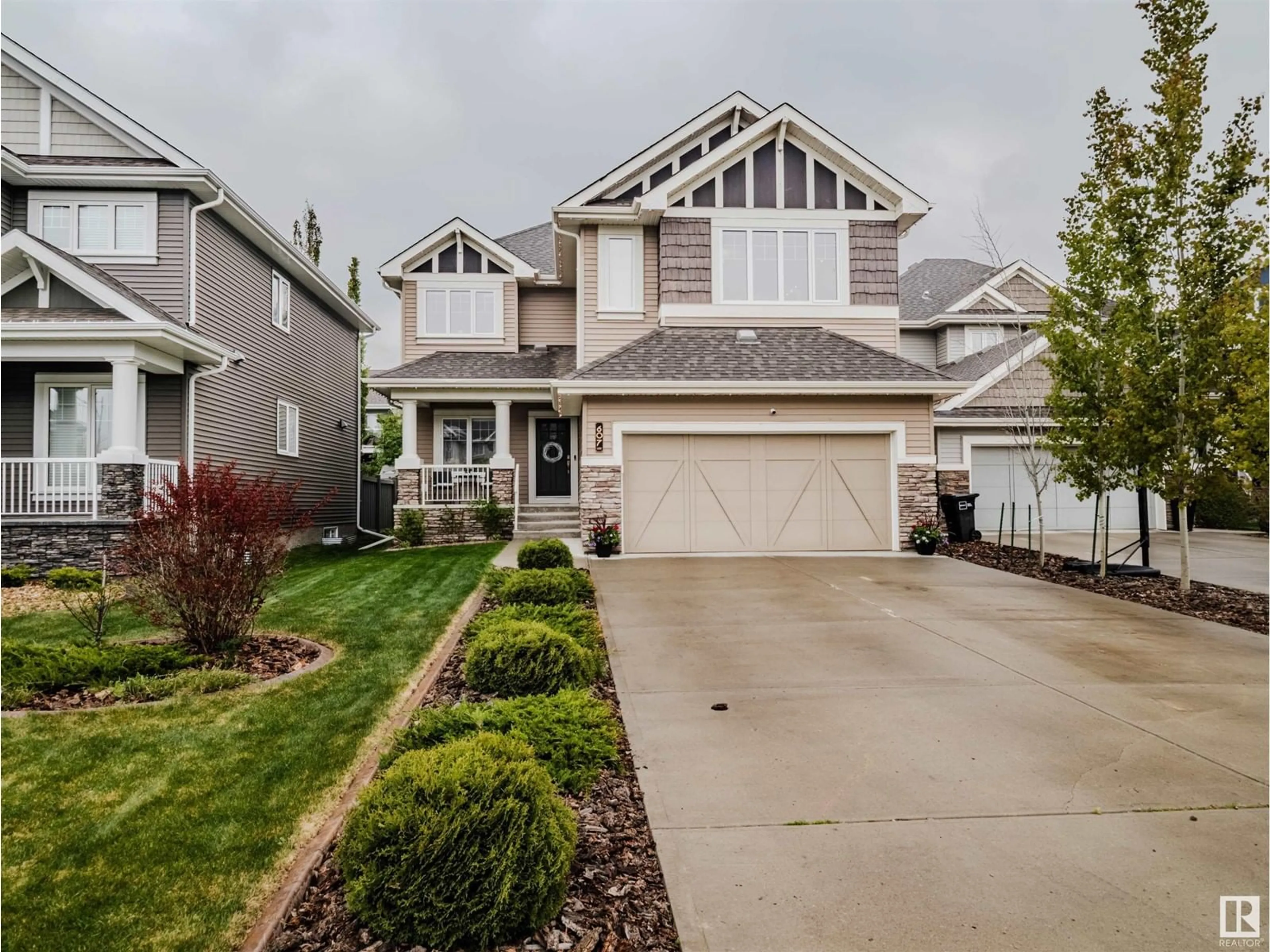 Home with vinyl exterior material, street for 607 HEMINGWAY PT, Edmonton Alberta T6M0M6