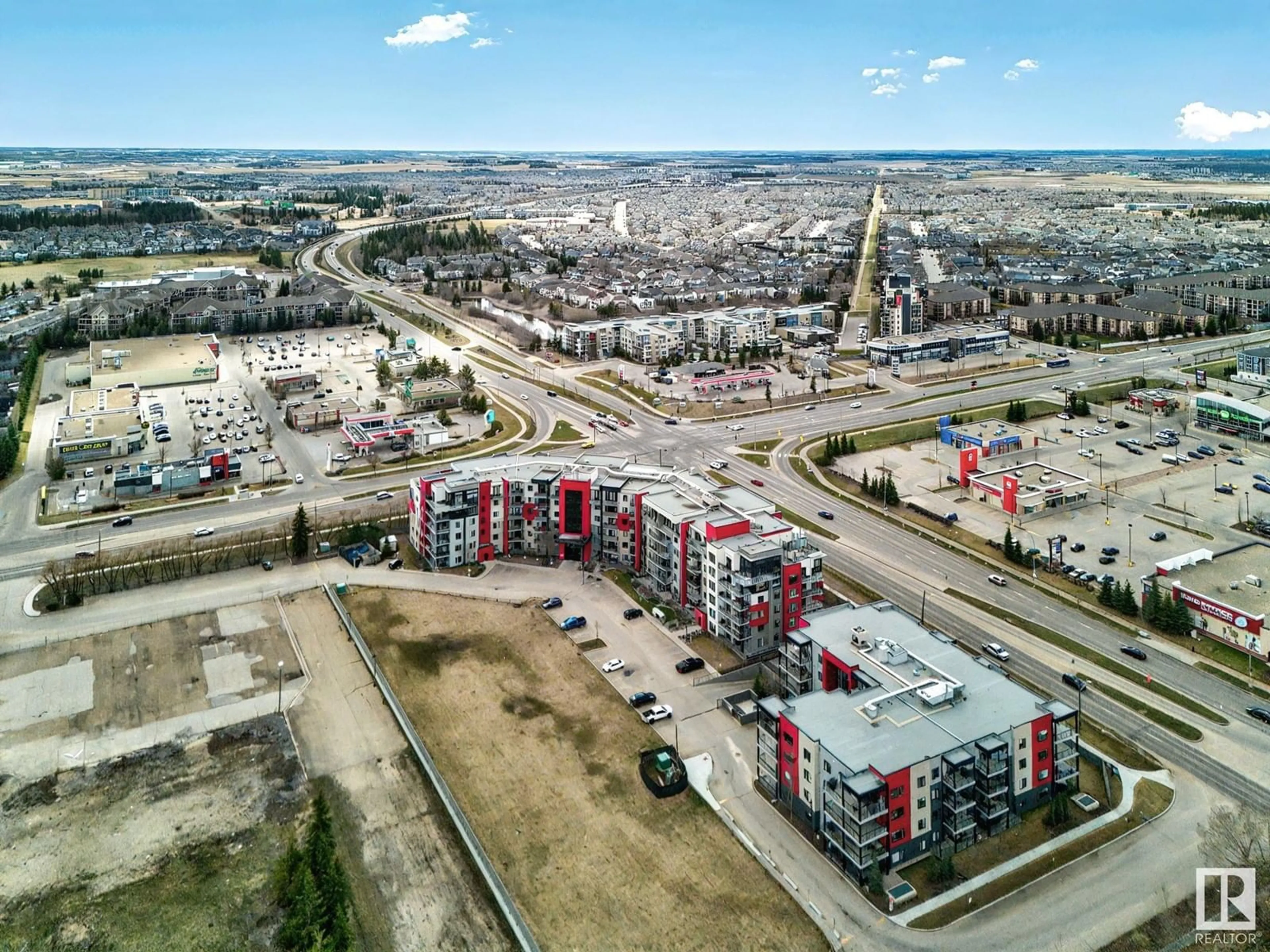 A pic from outside/outdoor area/front of a property/back of a property/a pic from drone, unknown for 11074 - 230 ELLERSLIE RD, Edmonton Alberta T6W2C2