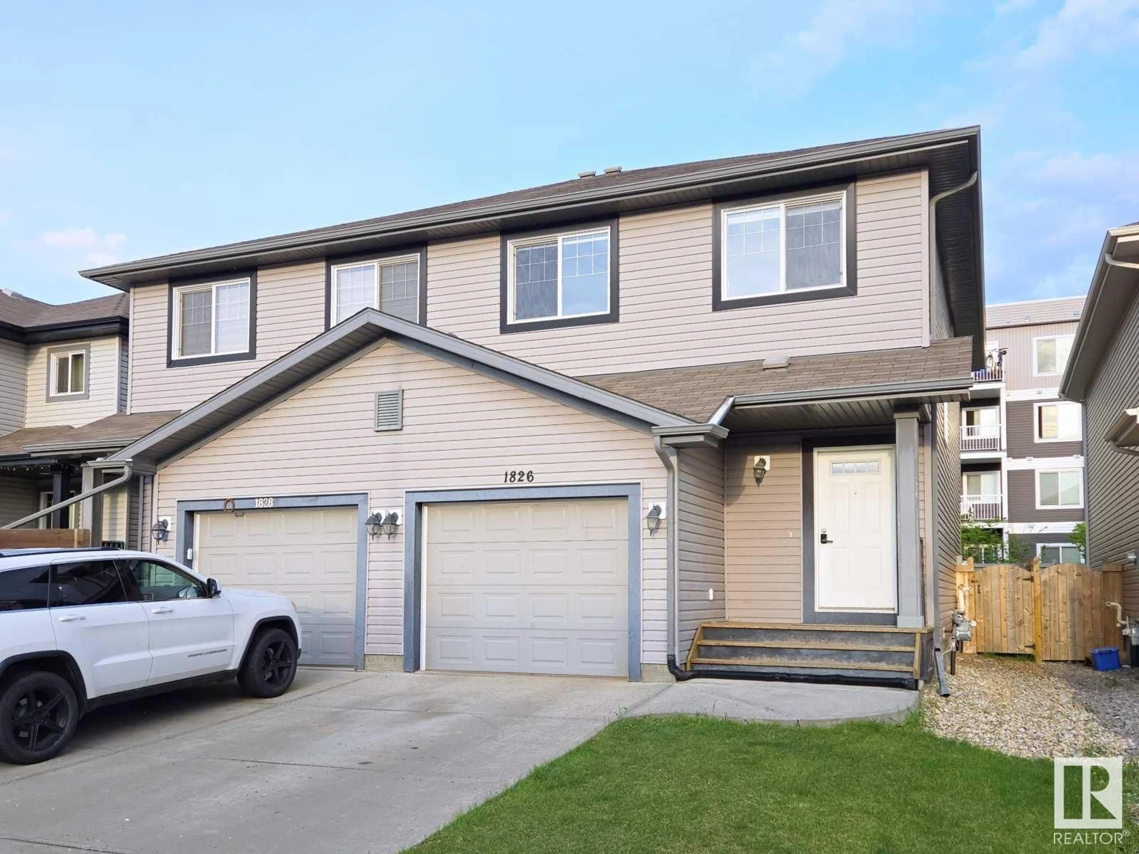 Home with vinyl exterior material, street for 1826 RUTHERFORD RD, Edmonton Alberta T6W0Z8