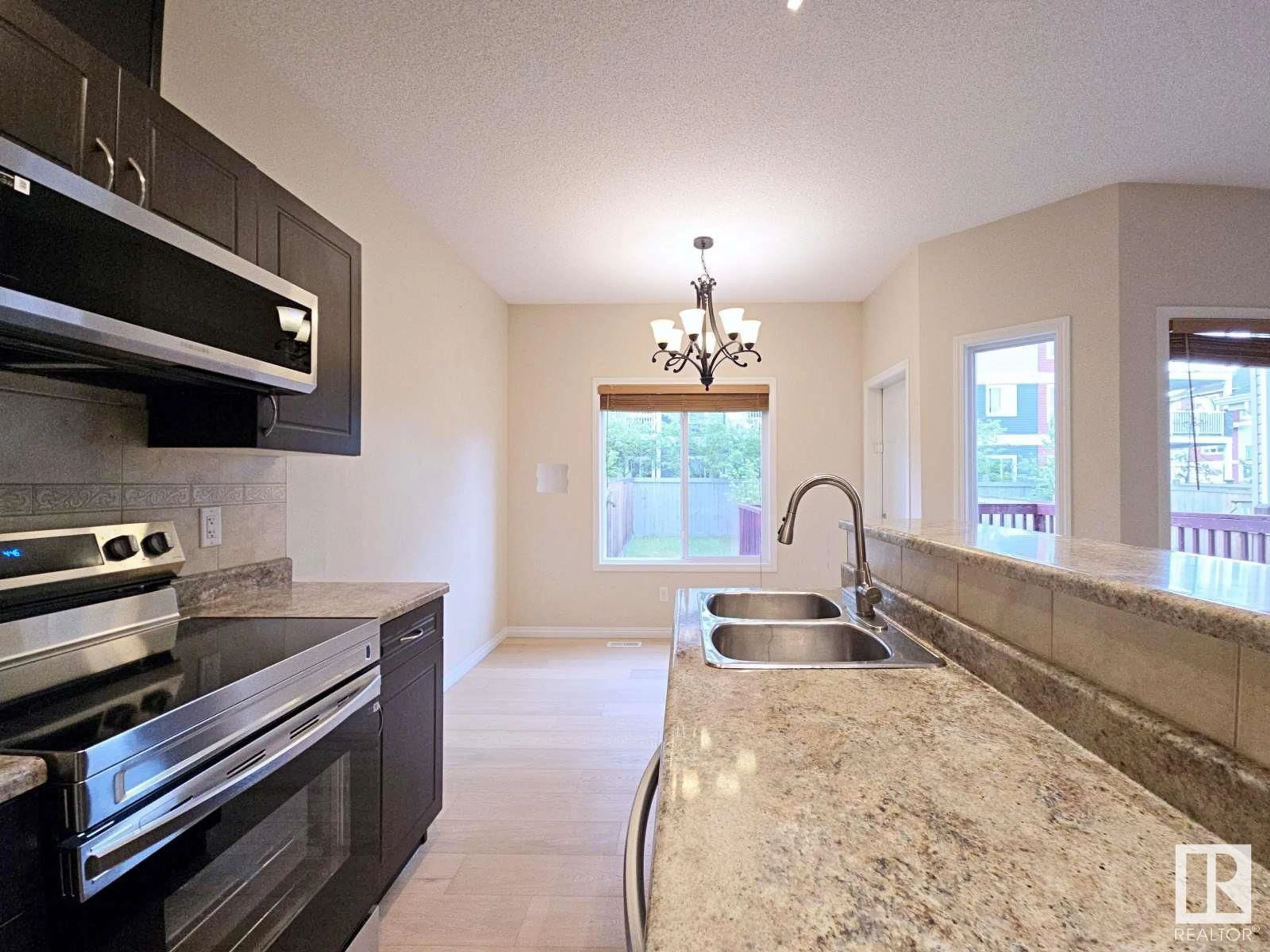 Open concept kitchen, ceramic/tile floor for 1826 RUTHERFORD RD, Edmonton Alberta T6W0Z8