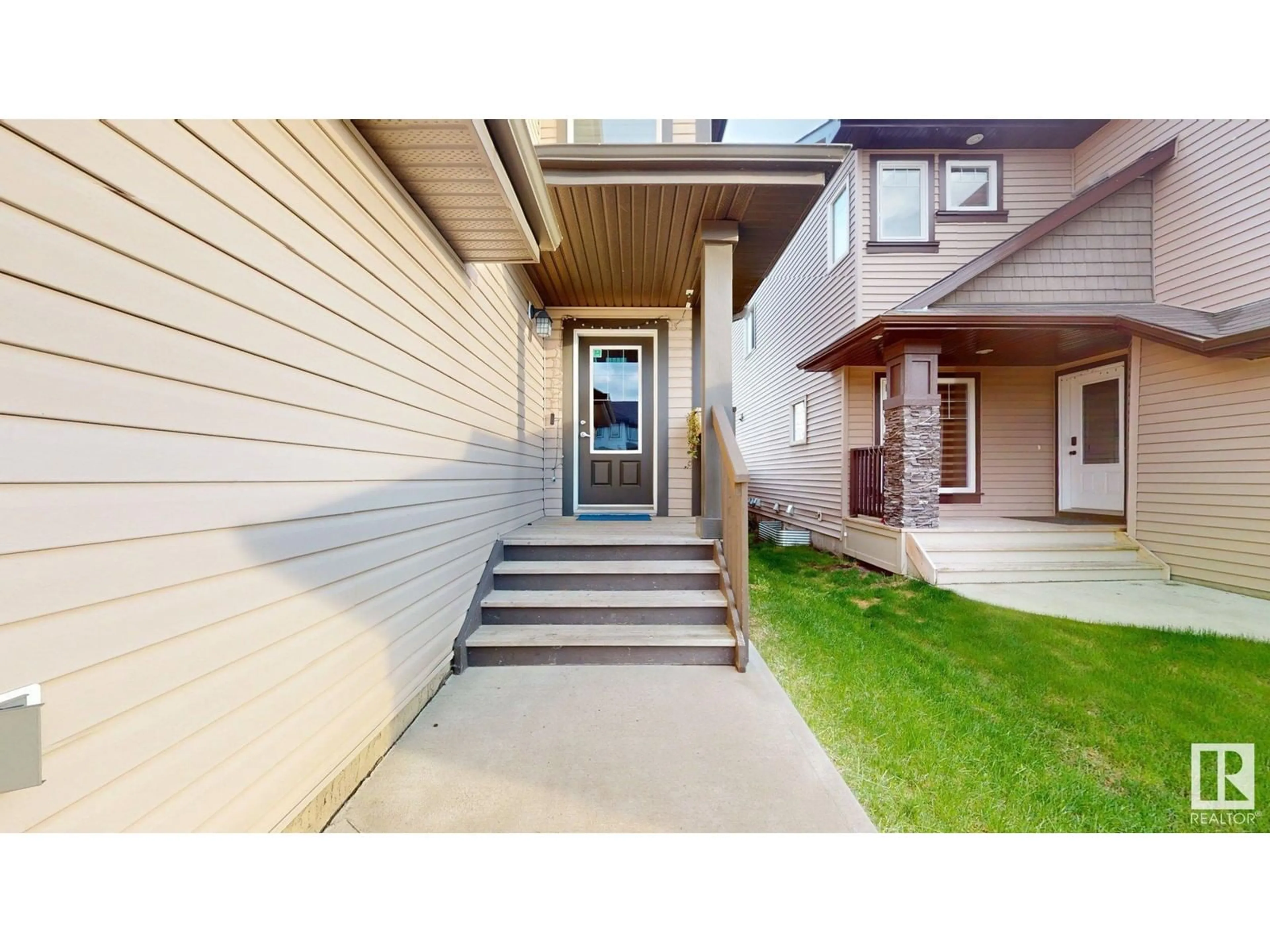 Home with vinyl exterior material, street for 3215 15 AV, Edmonton Alberta T6T0V2