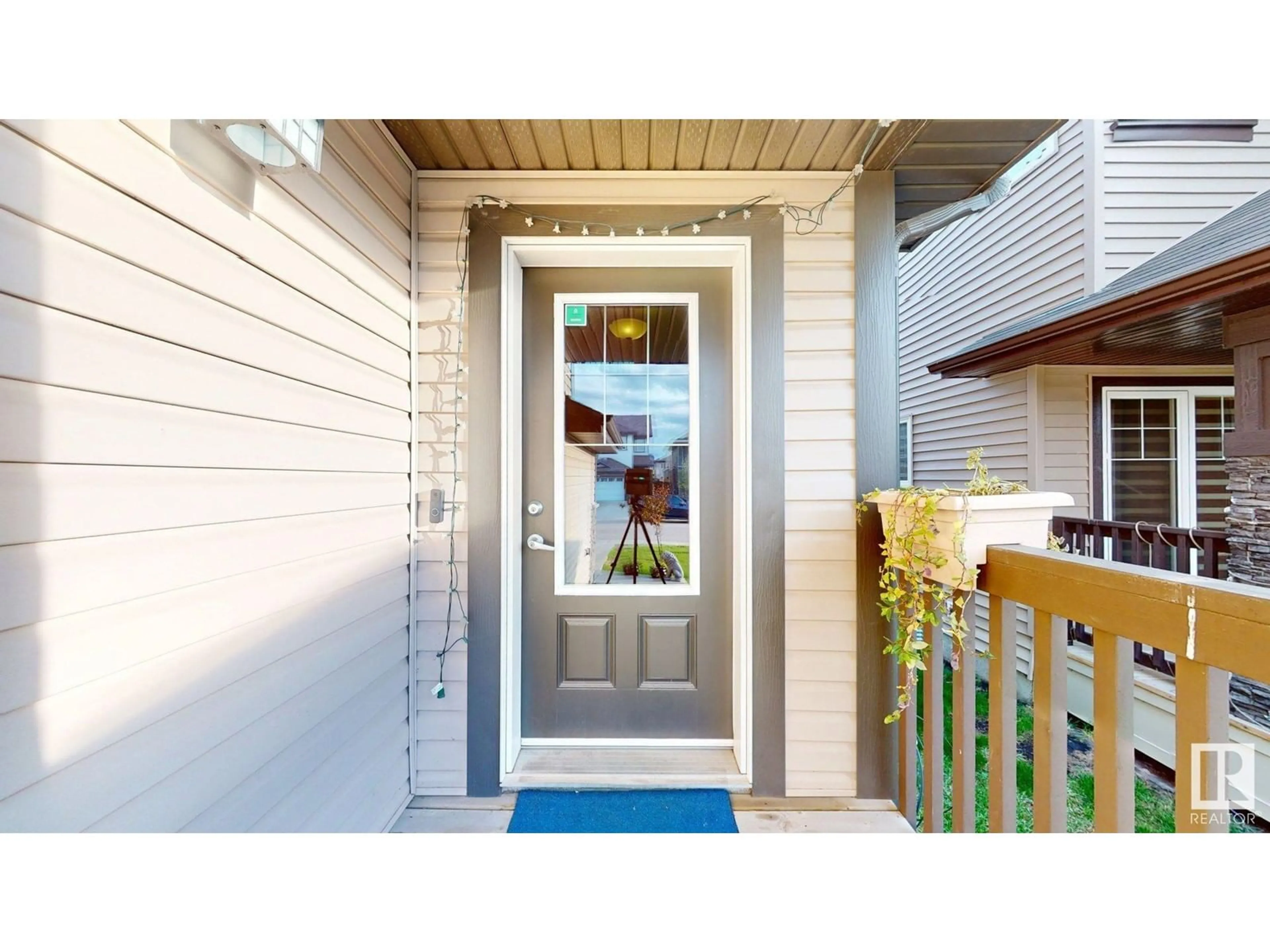 Home with vinyl exterior material, street for 3215 15 AV, Edmonton Alberta T6T0V2