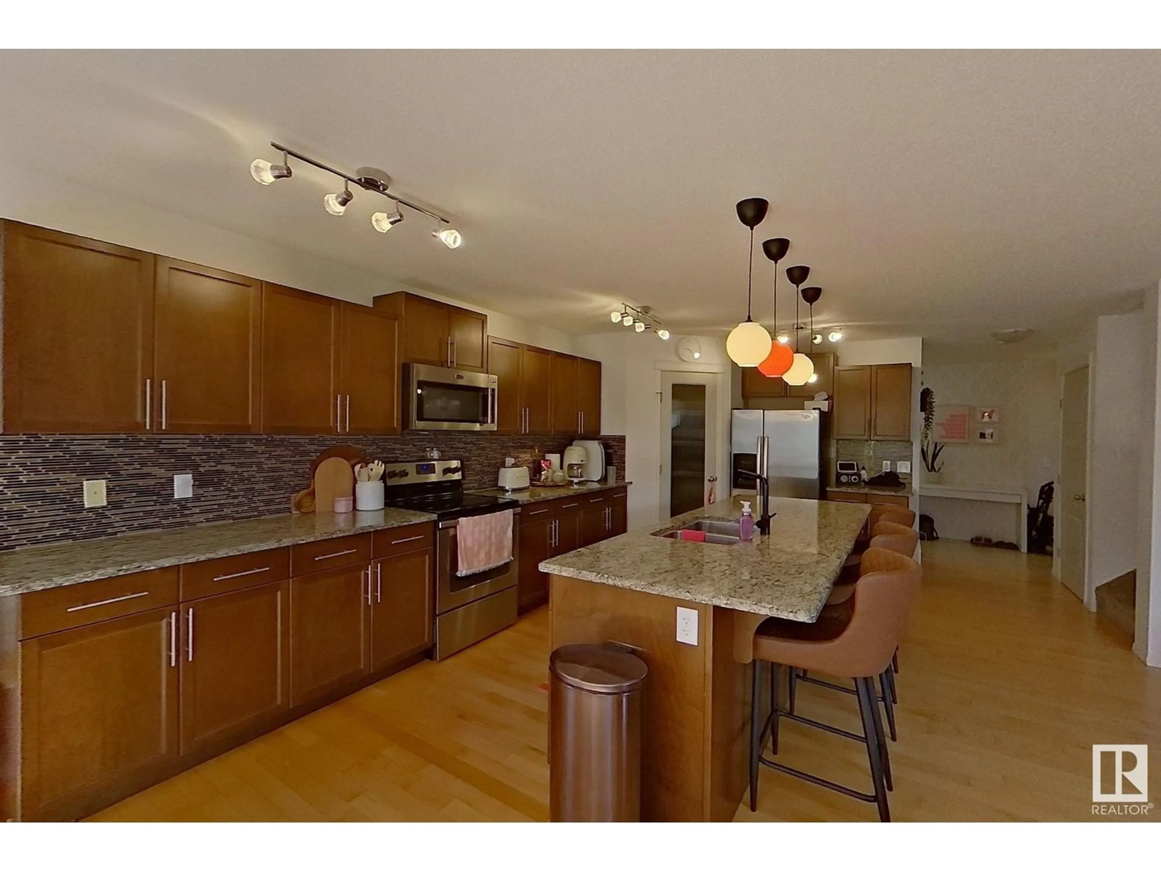 Open concept kitchen, unknown for 5703 18 AV, Edmonton Alberta T6X1P6